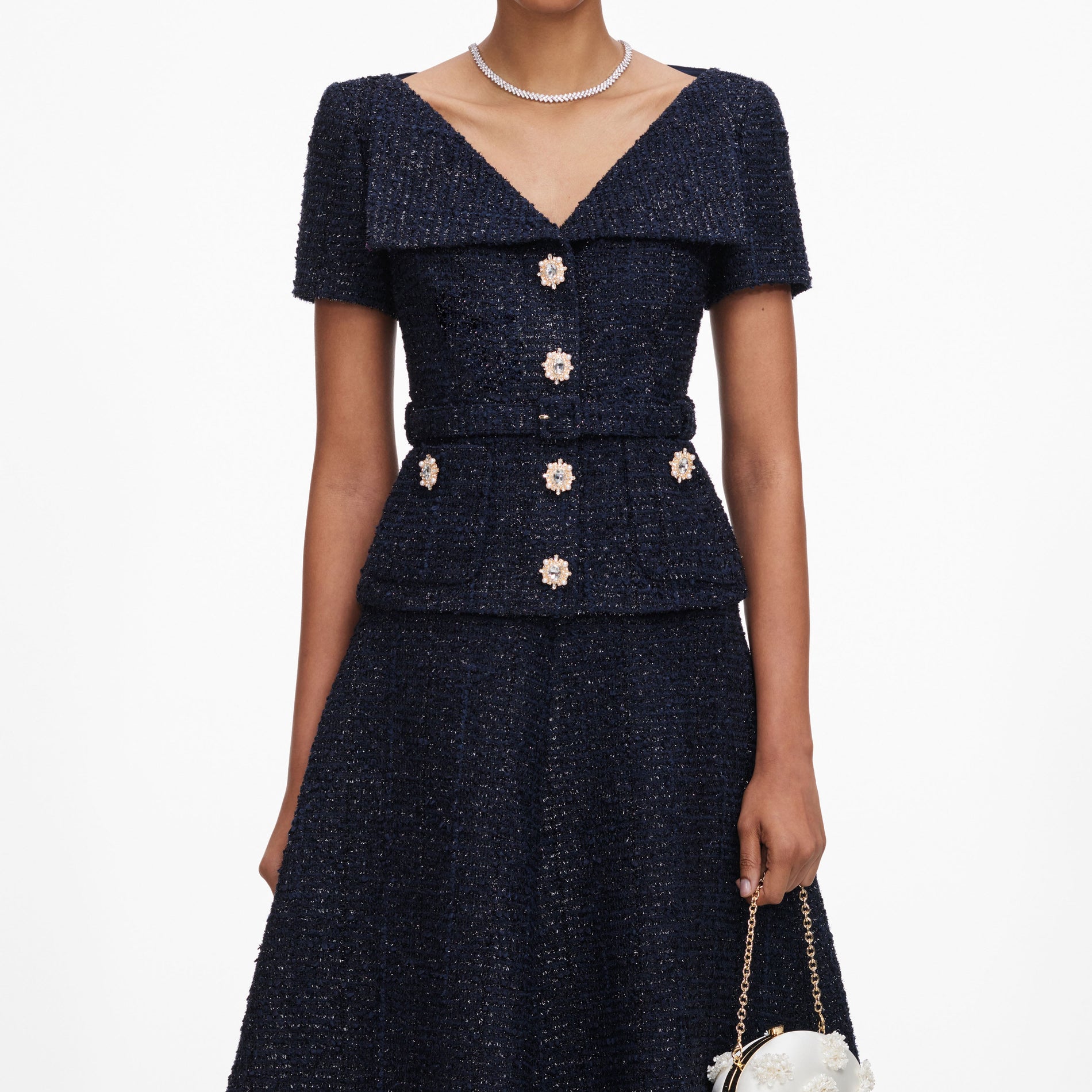 A close up of a woman wearing the Navy Boucle Tailored Midi Dress