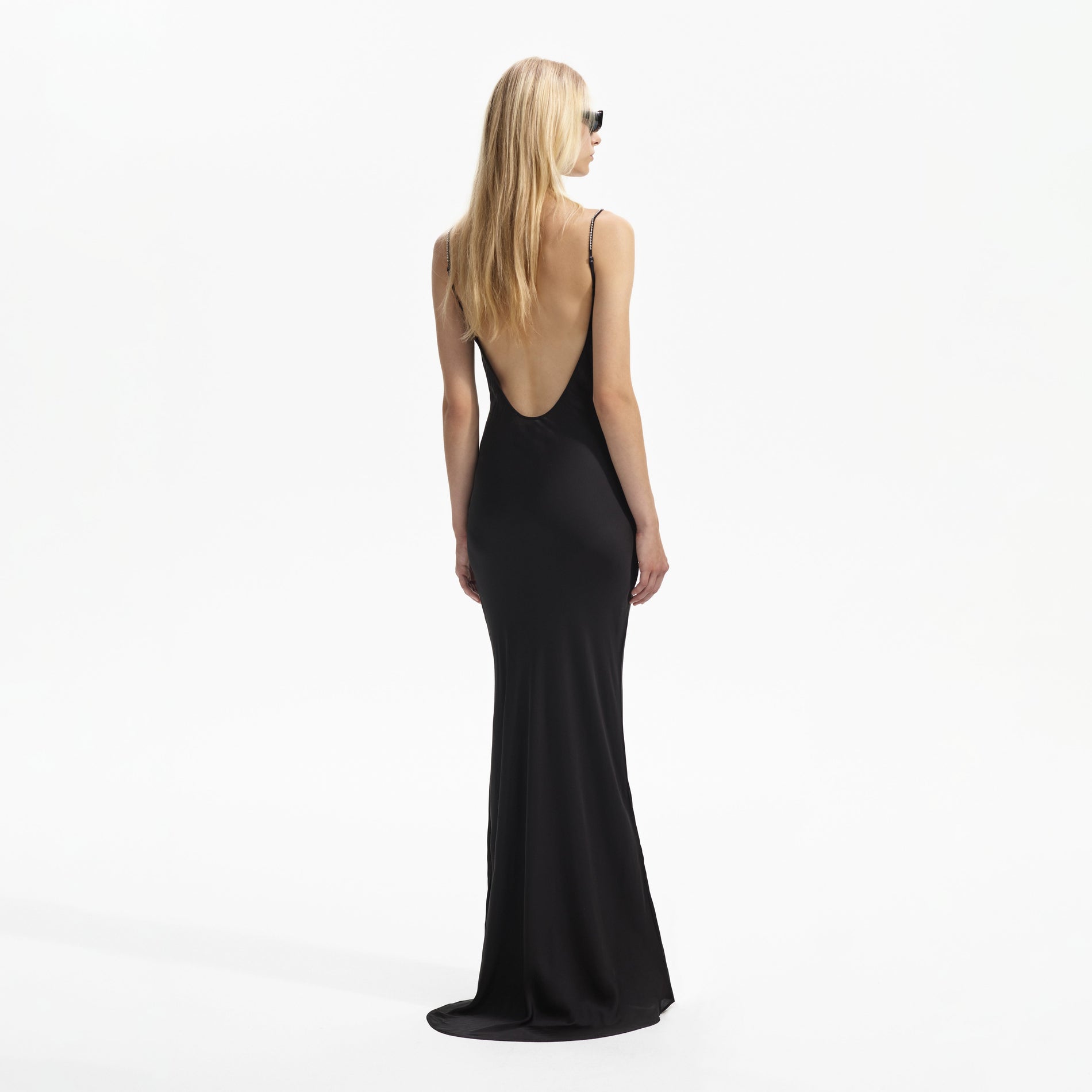 Back view of a woman wearing the Black Lace Satin Maxi Dress