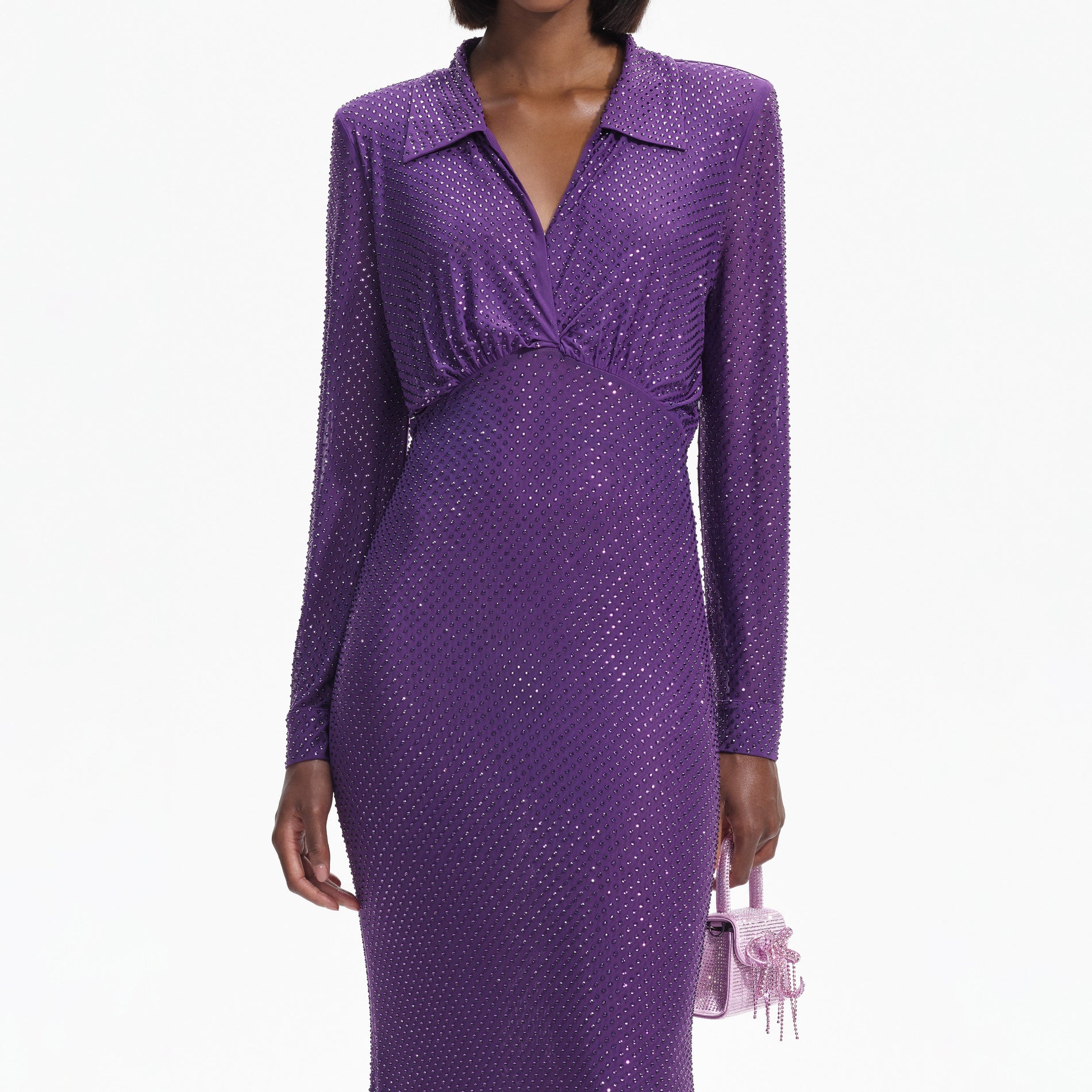 A close up of a woman wearing the Purple Rhinestone Mesh Maxi Dress