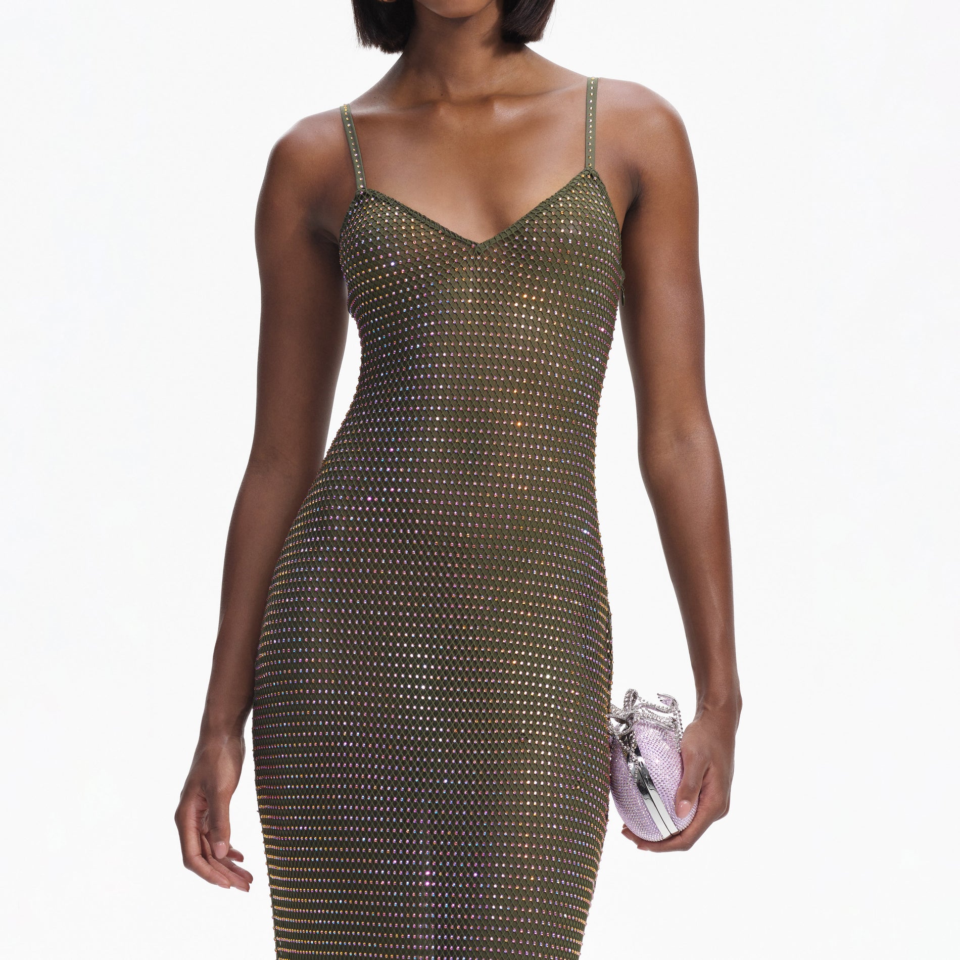 A close up of a woman wearing the Khaki Rhinestone Maxi Dress