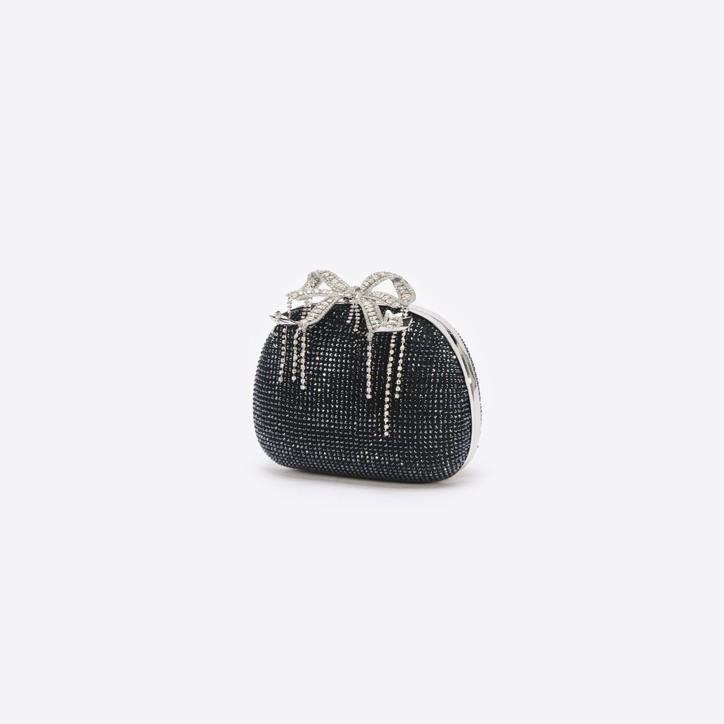 Side view of a woman wearing the Black Satin Rhinestone Clutch Bag