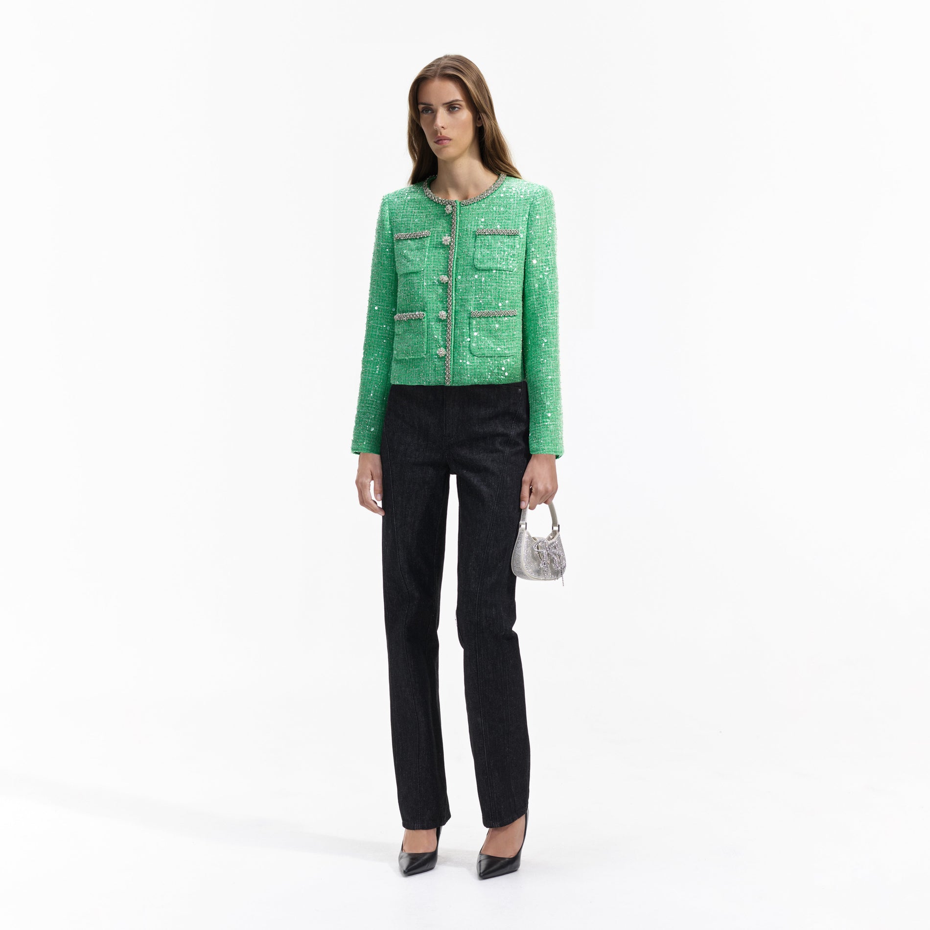Side view of a woman wearing the Green Boucle Jacket