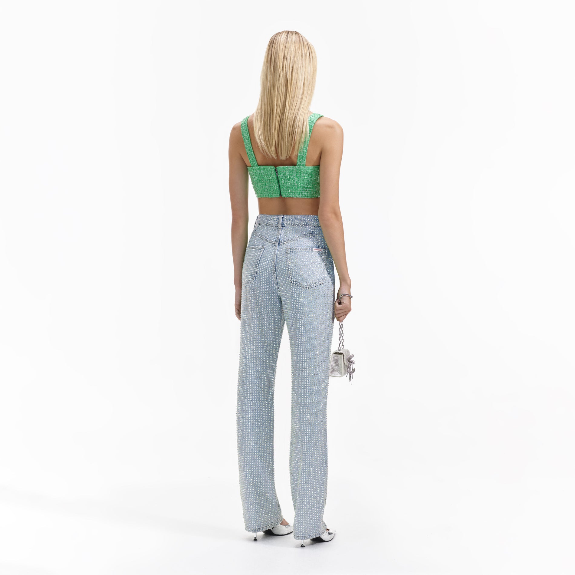 Back view of a woman wearing the Green Boucle Crop Top