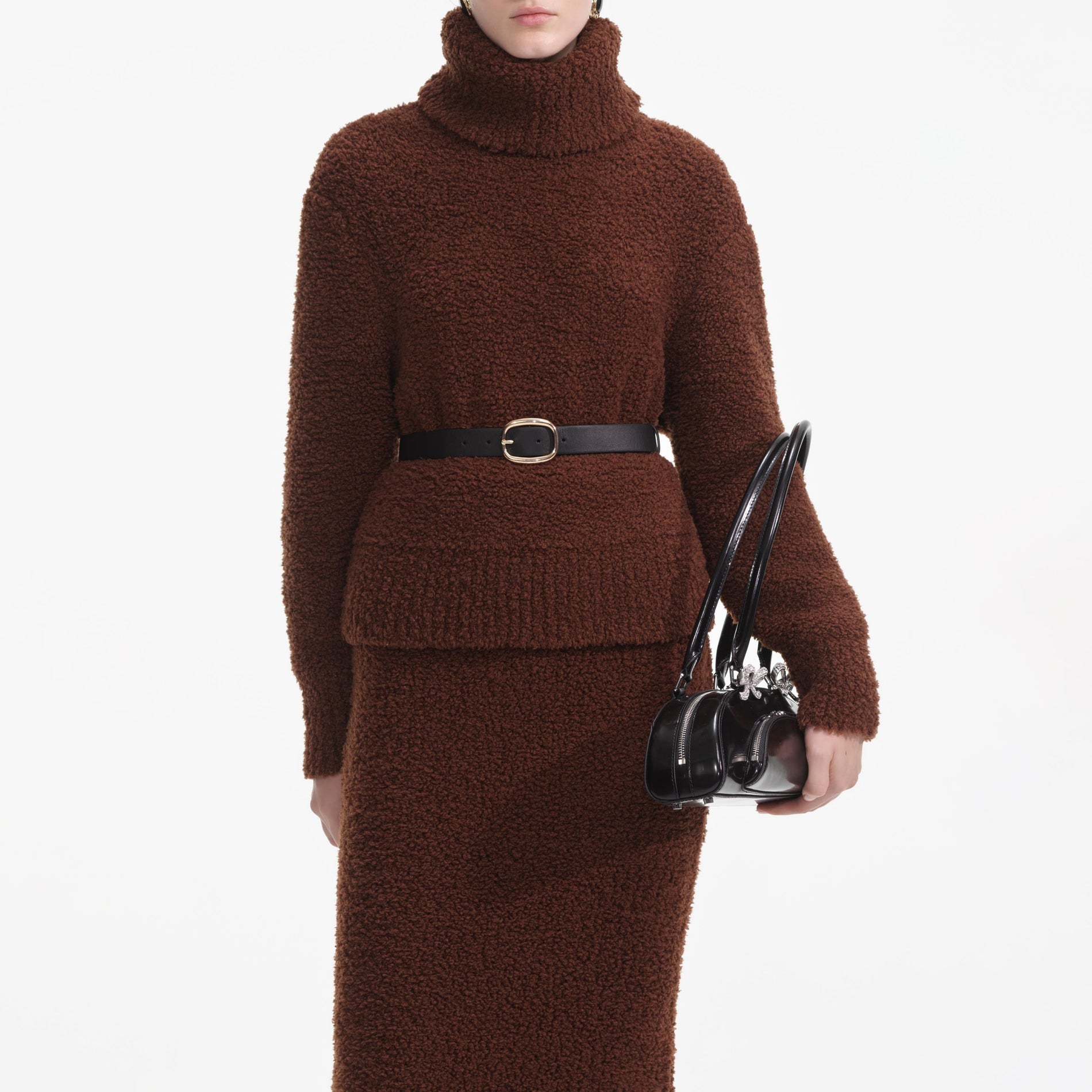 A close up of a woman wearing the Brown Fluffy Knit Midi Skirt