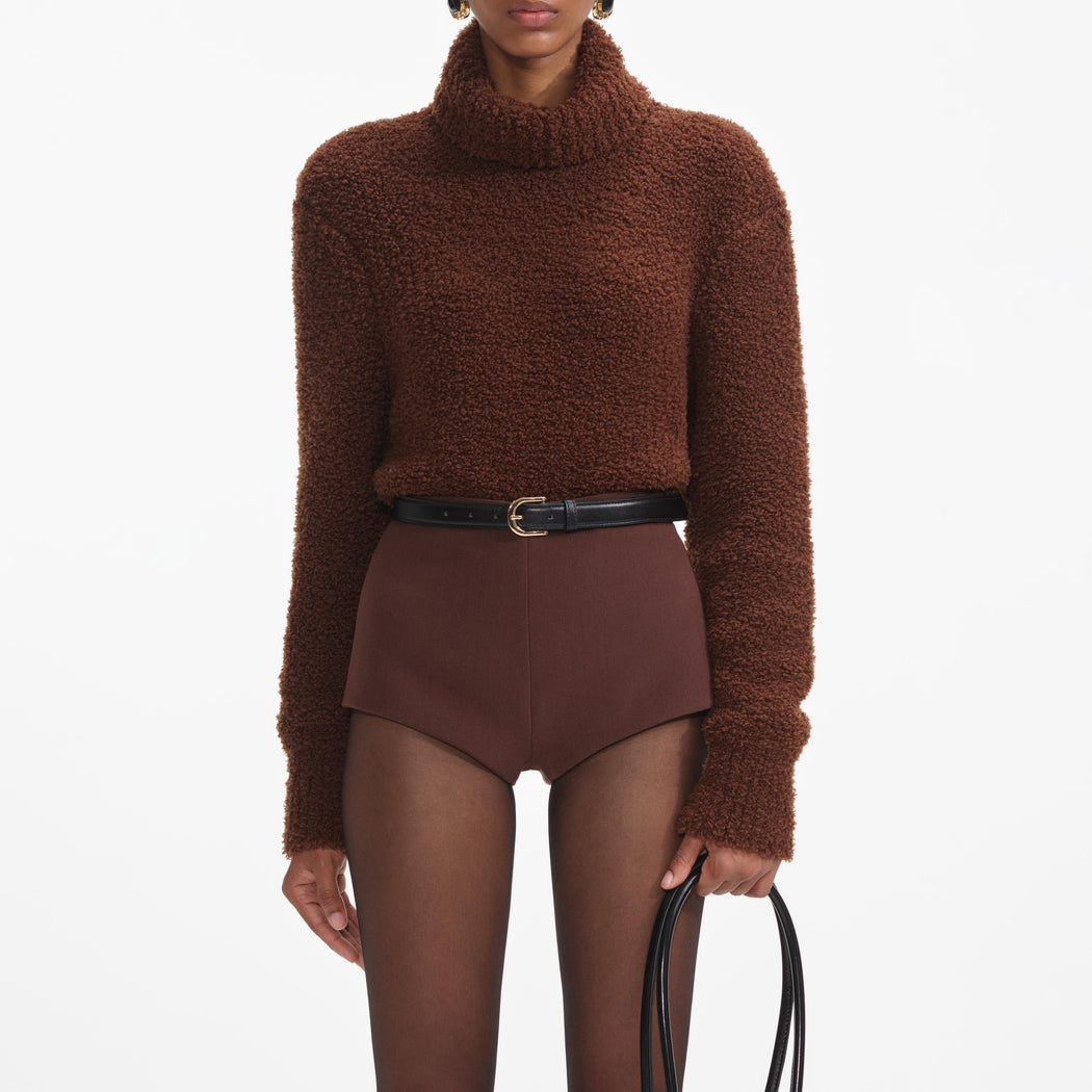 A close up of a woman wearing the Brown Fluffy Knit Jumper