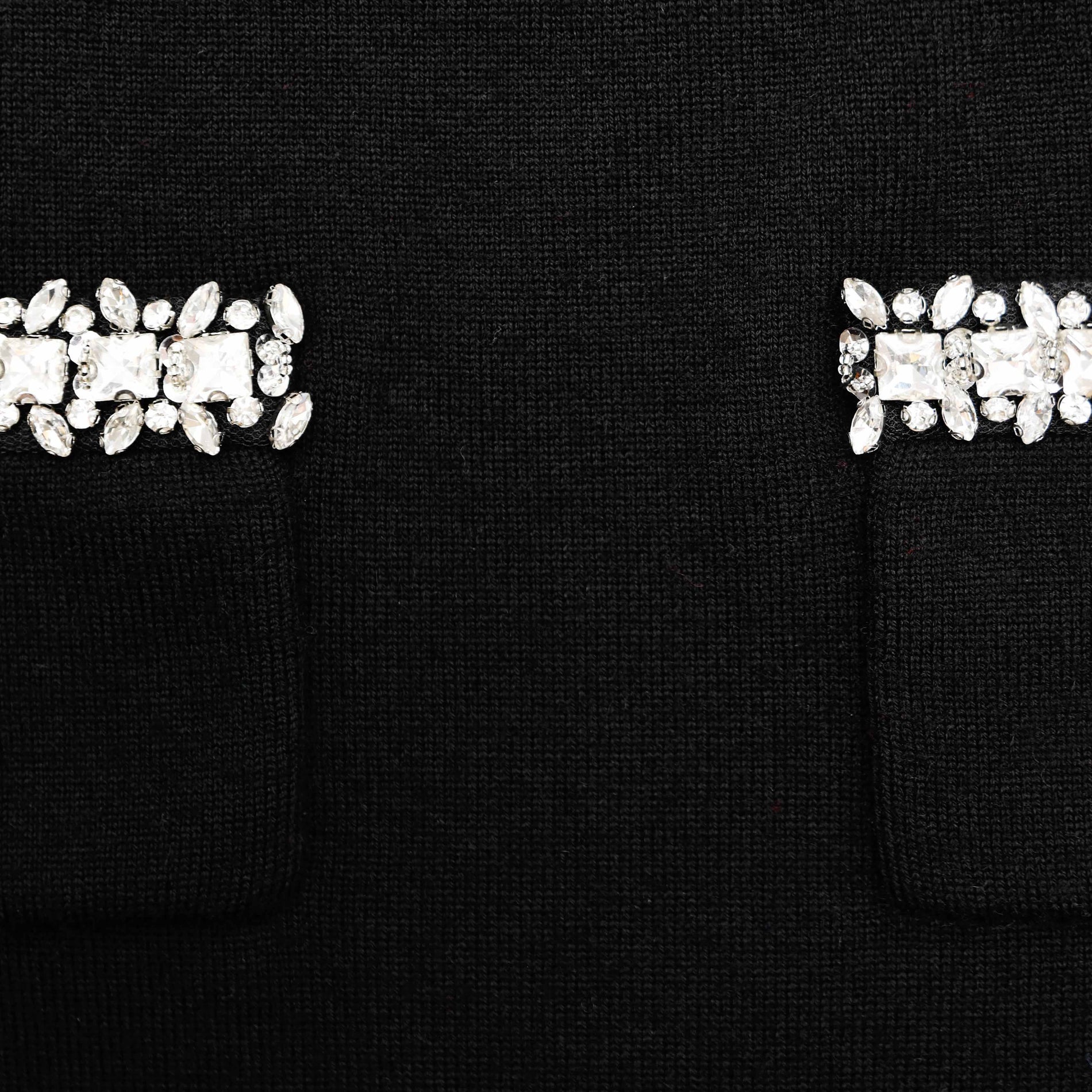 A close up of the fabric for the Black Knit Embellished Mini Skirt