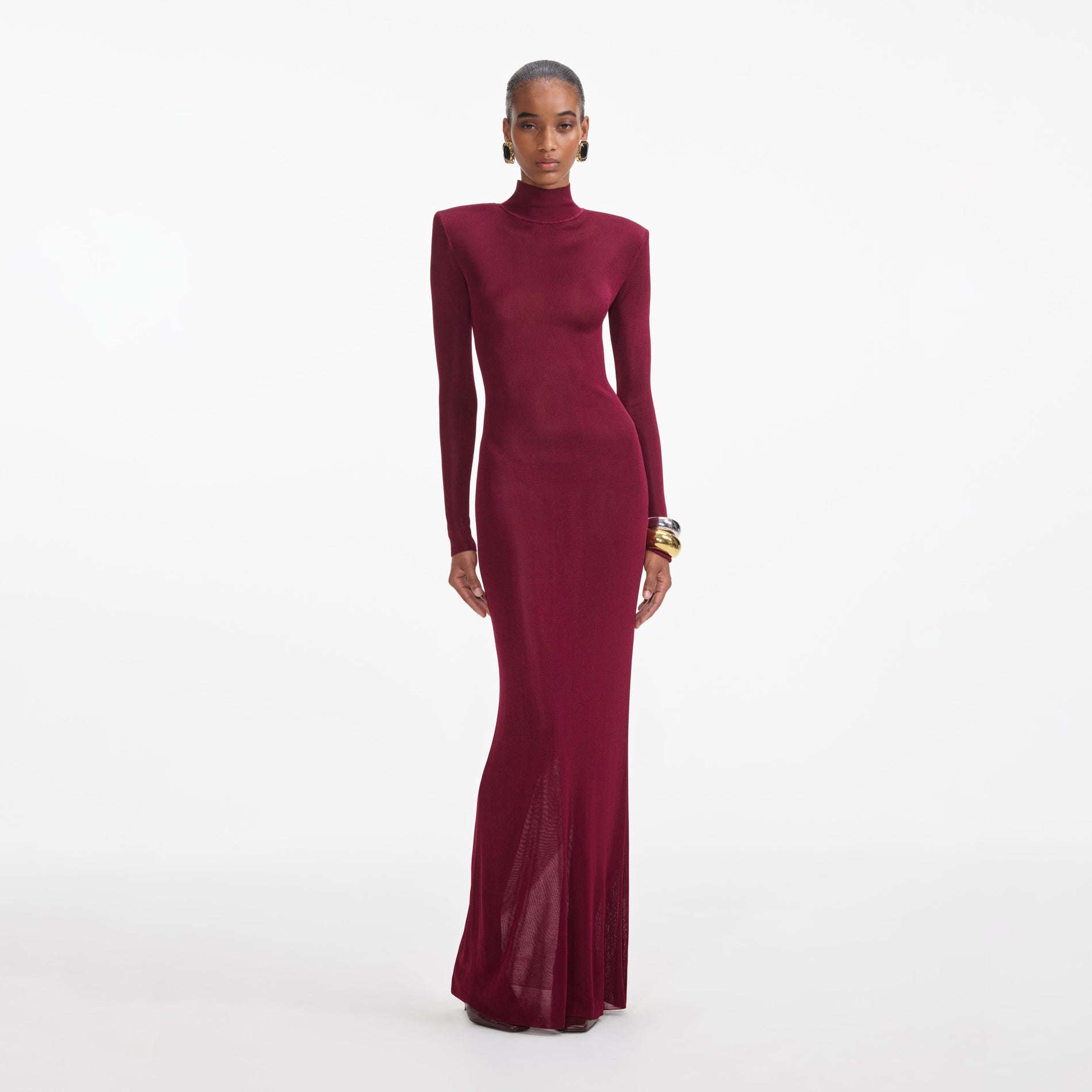 Front view of a woman wearing the Burgundy Viscose Knit Maxi Dress