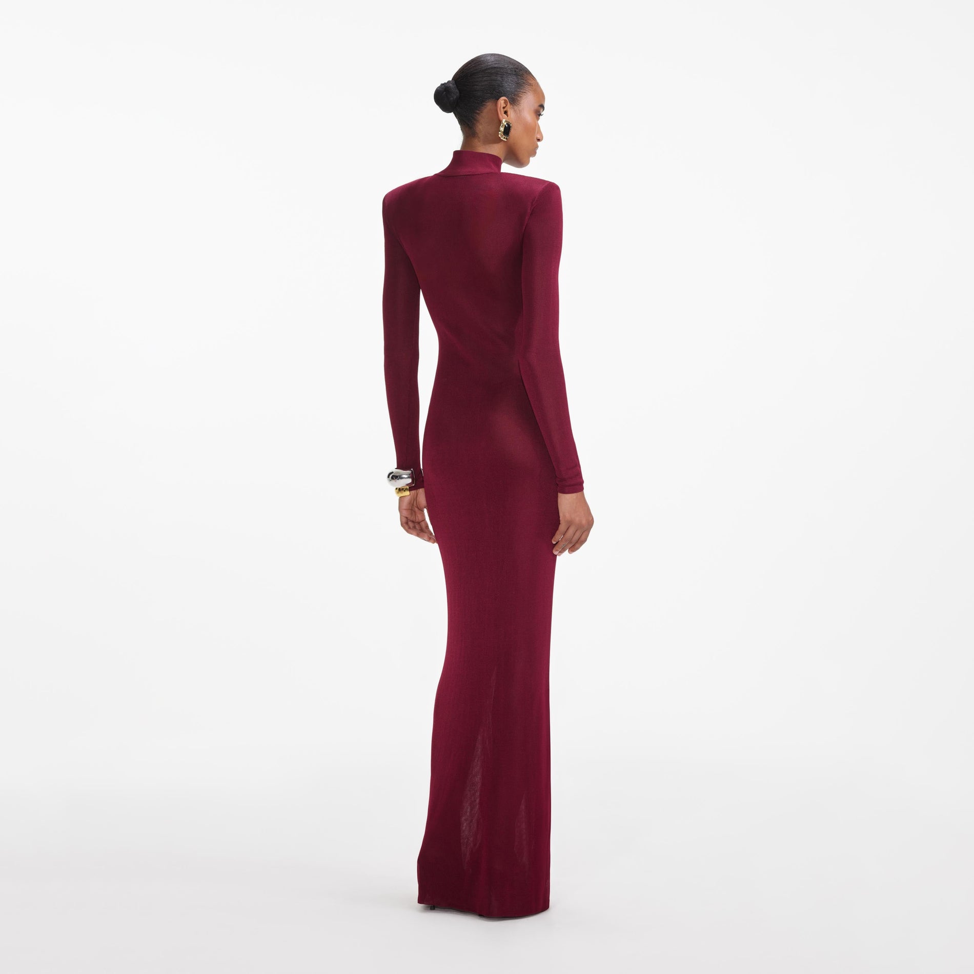 Back view of a woman wearing the Burgundy Viscose Knit Maxi Dress