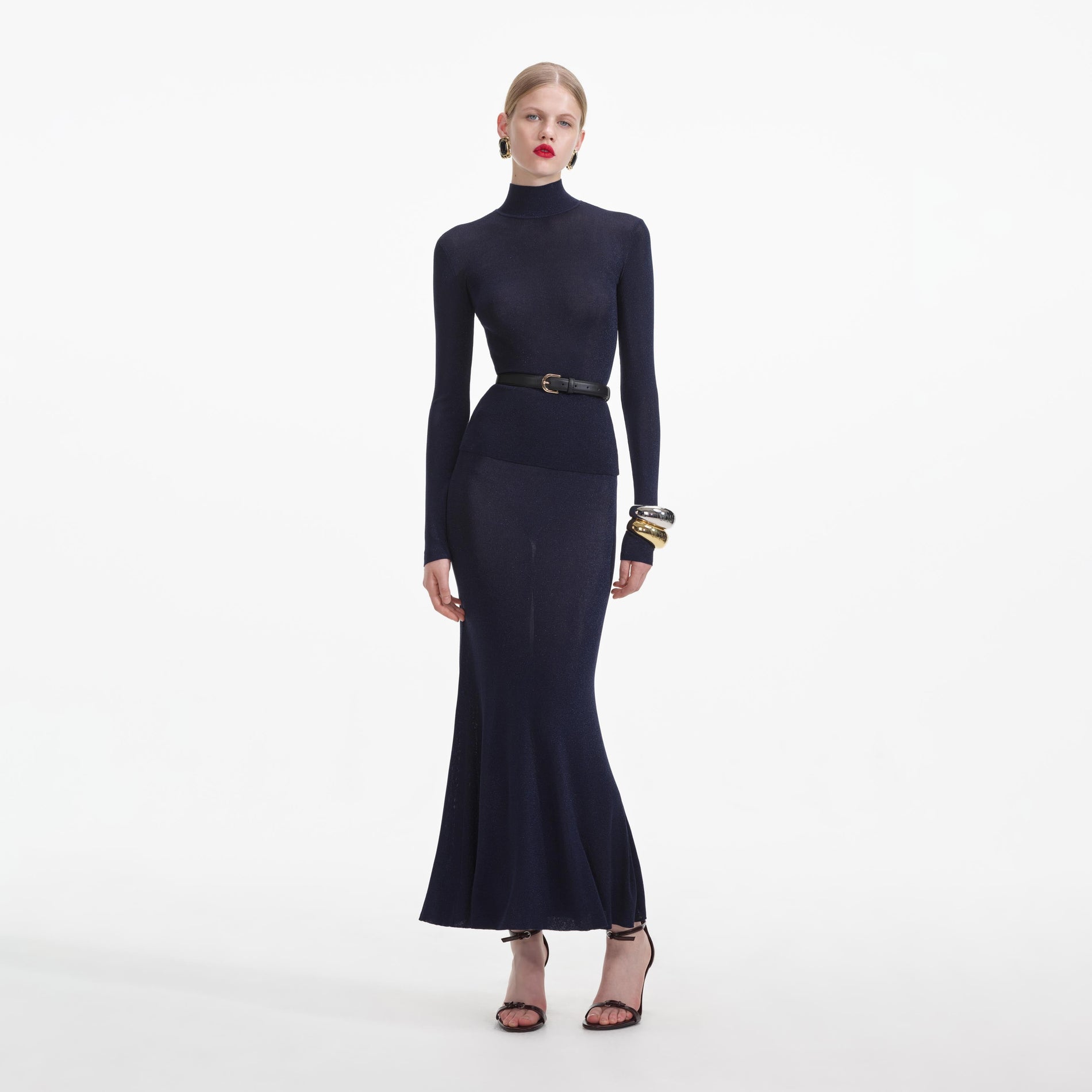 Front view of a woman wearing the Navy Viscose Knit Maxi Skirt