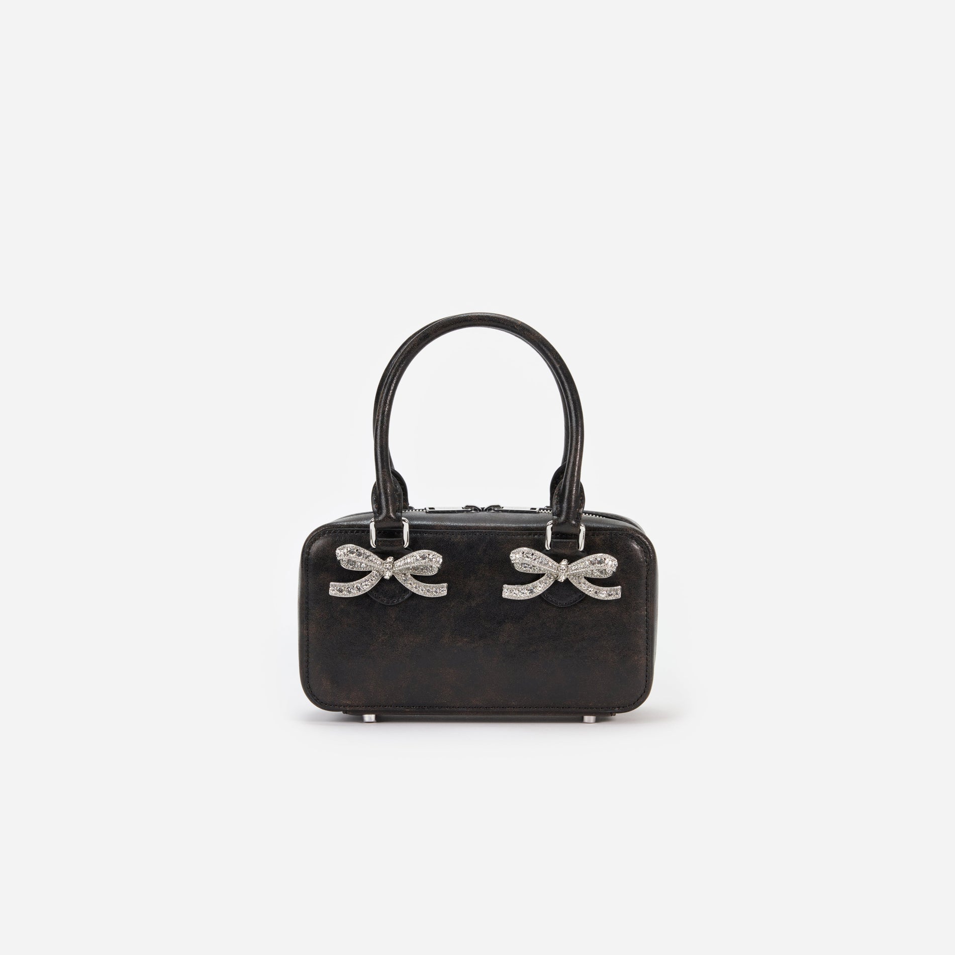 Front view of a woman wearing the Black Distressed Leather Mini Tote Bag
