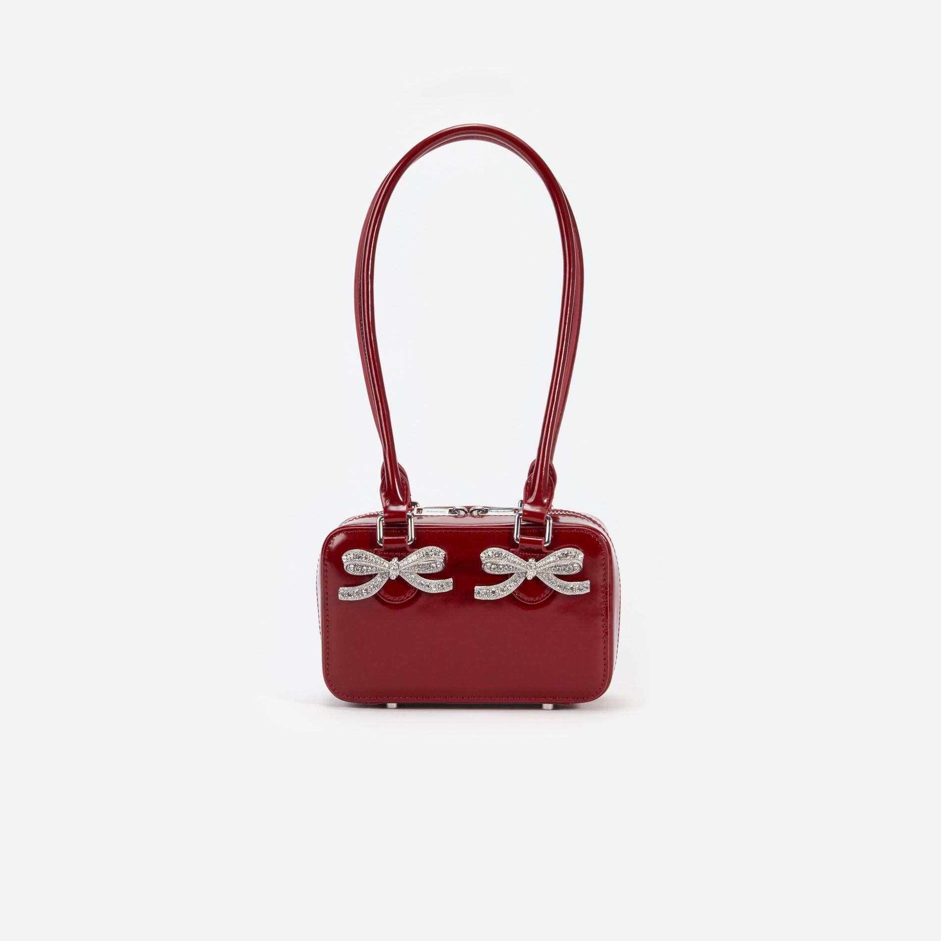 Front view of a woman wearing the Burgundy Leather Shoulder Bag