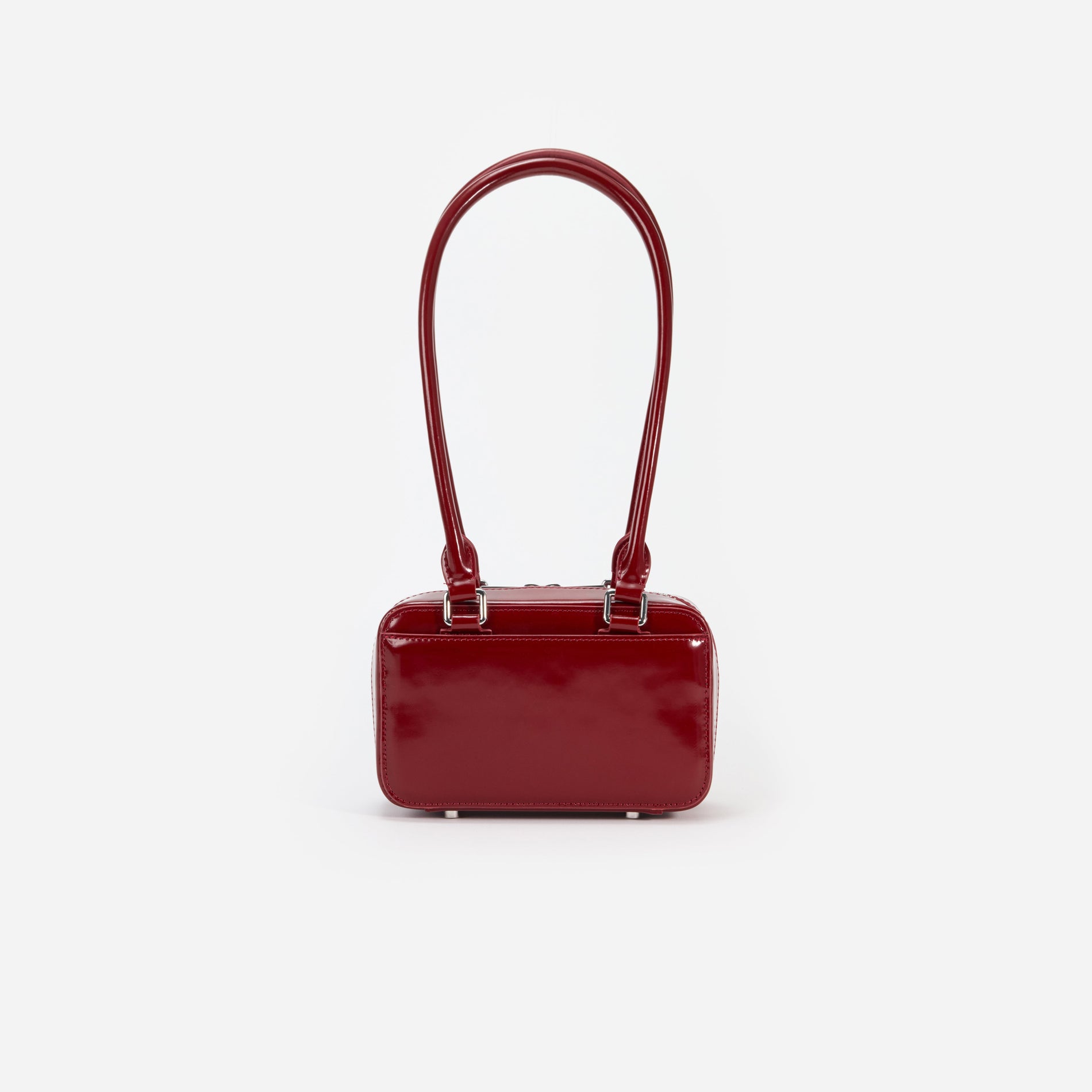 Back view of a woman wearing the Burgundy Leather Shoulder Bag