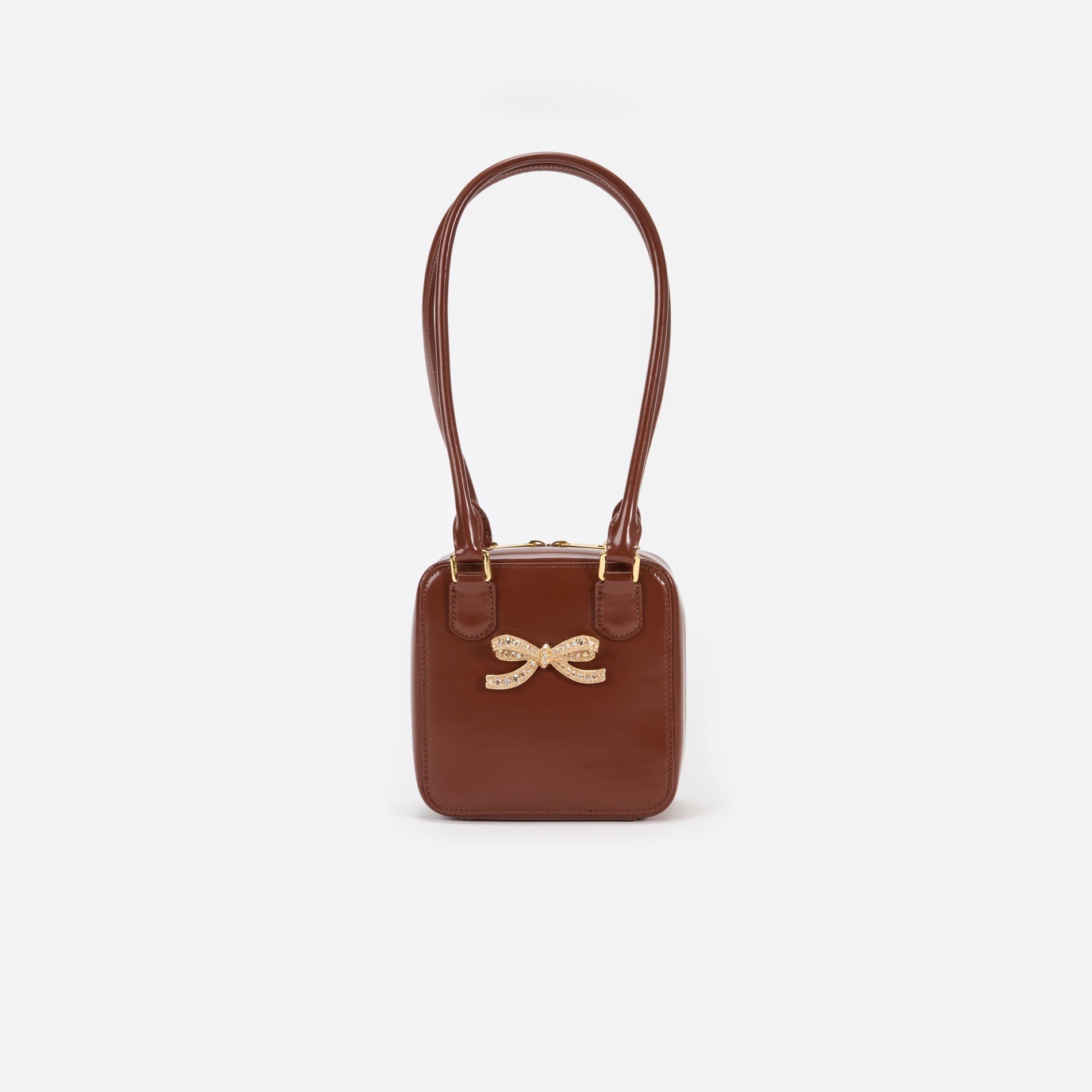 Front view of a woman wearing the Brown Leather Square Shoulder Bag