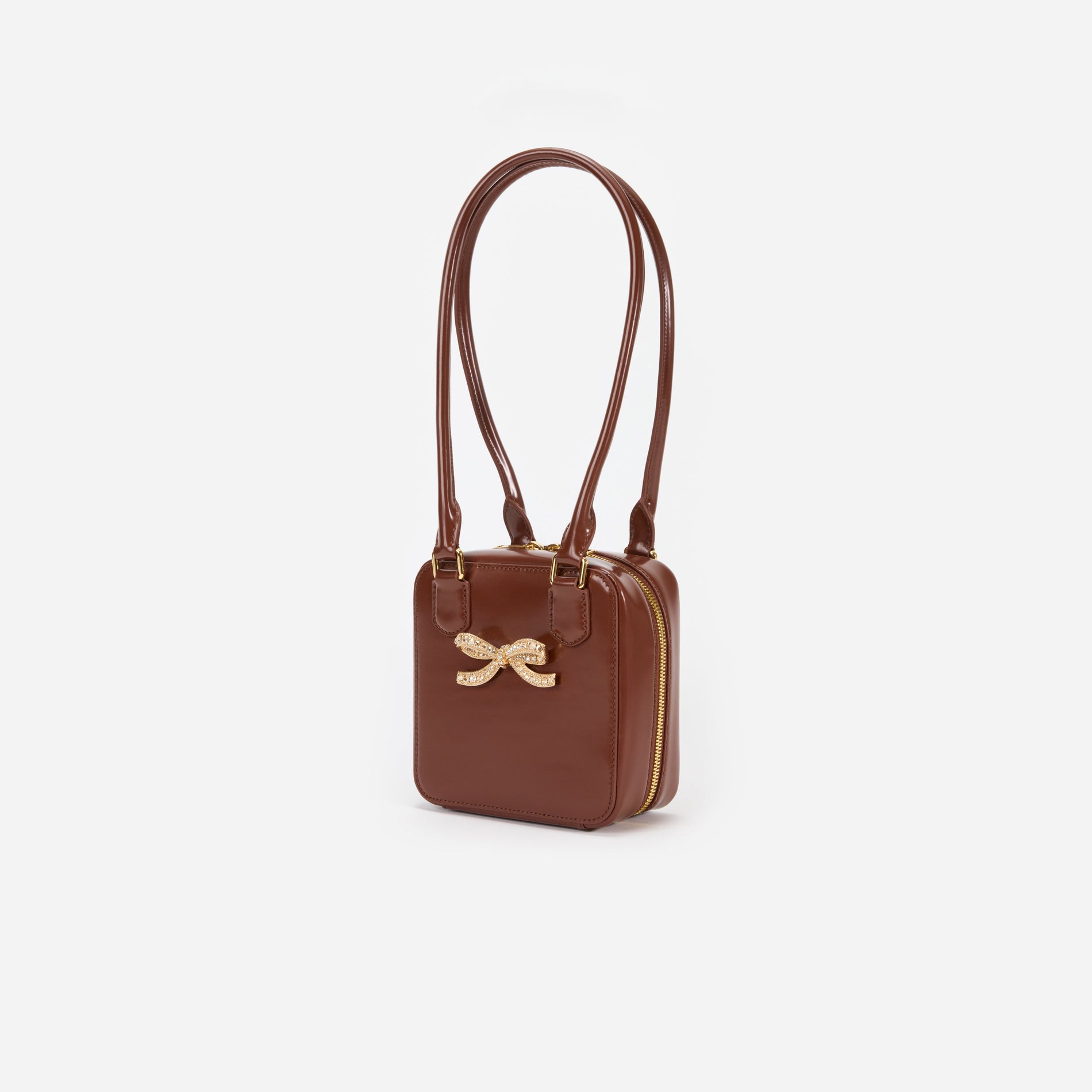 Side view of a woman wearing the Brown Leather Square Shoulder Bag