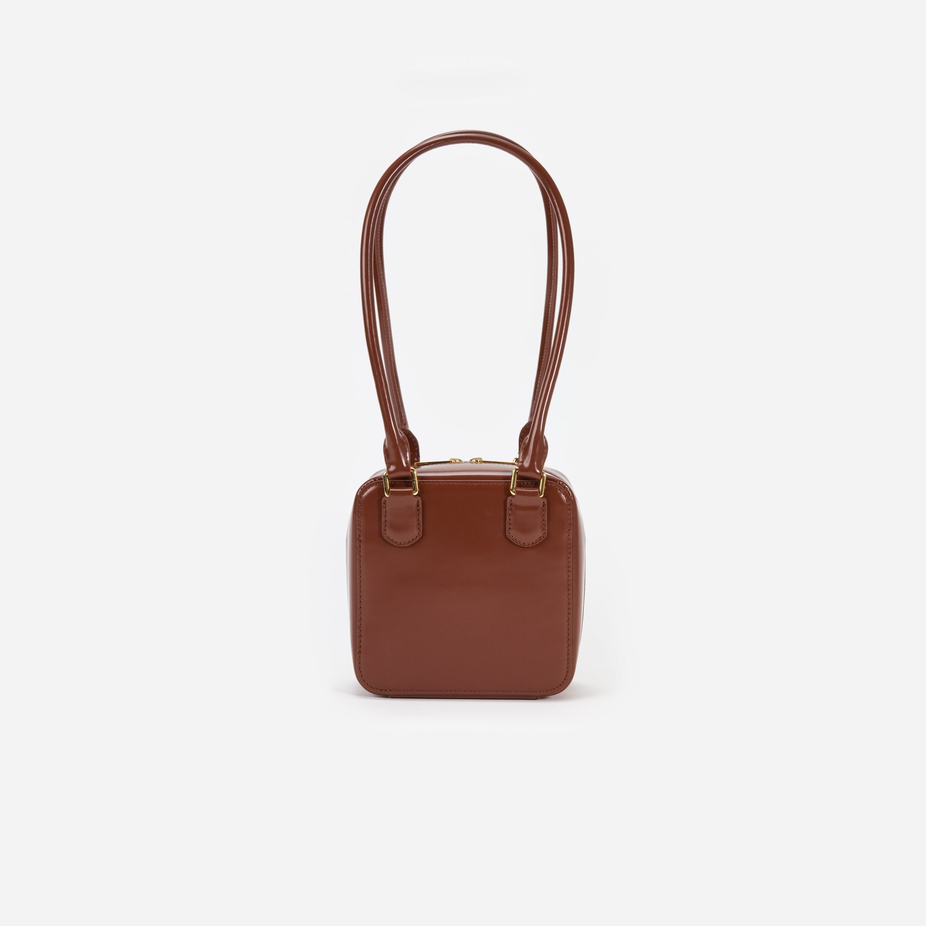 Back view of a woman wearing the Brown Leather Square Shoulder Bag