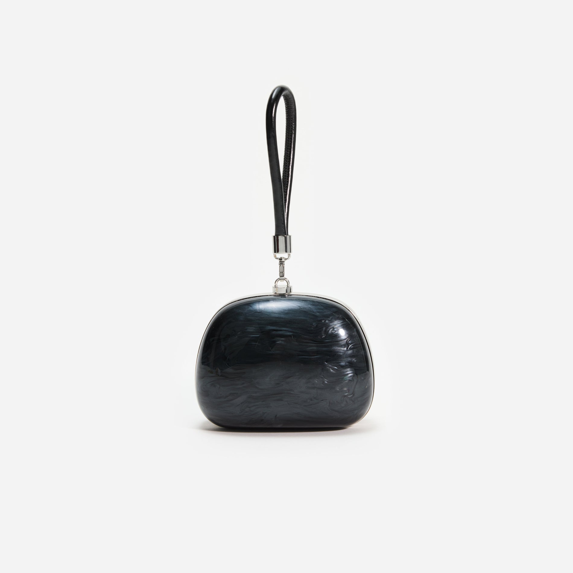 Back view of a woman wearing the Black Pearl Top Handle Clutch Bag