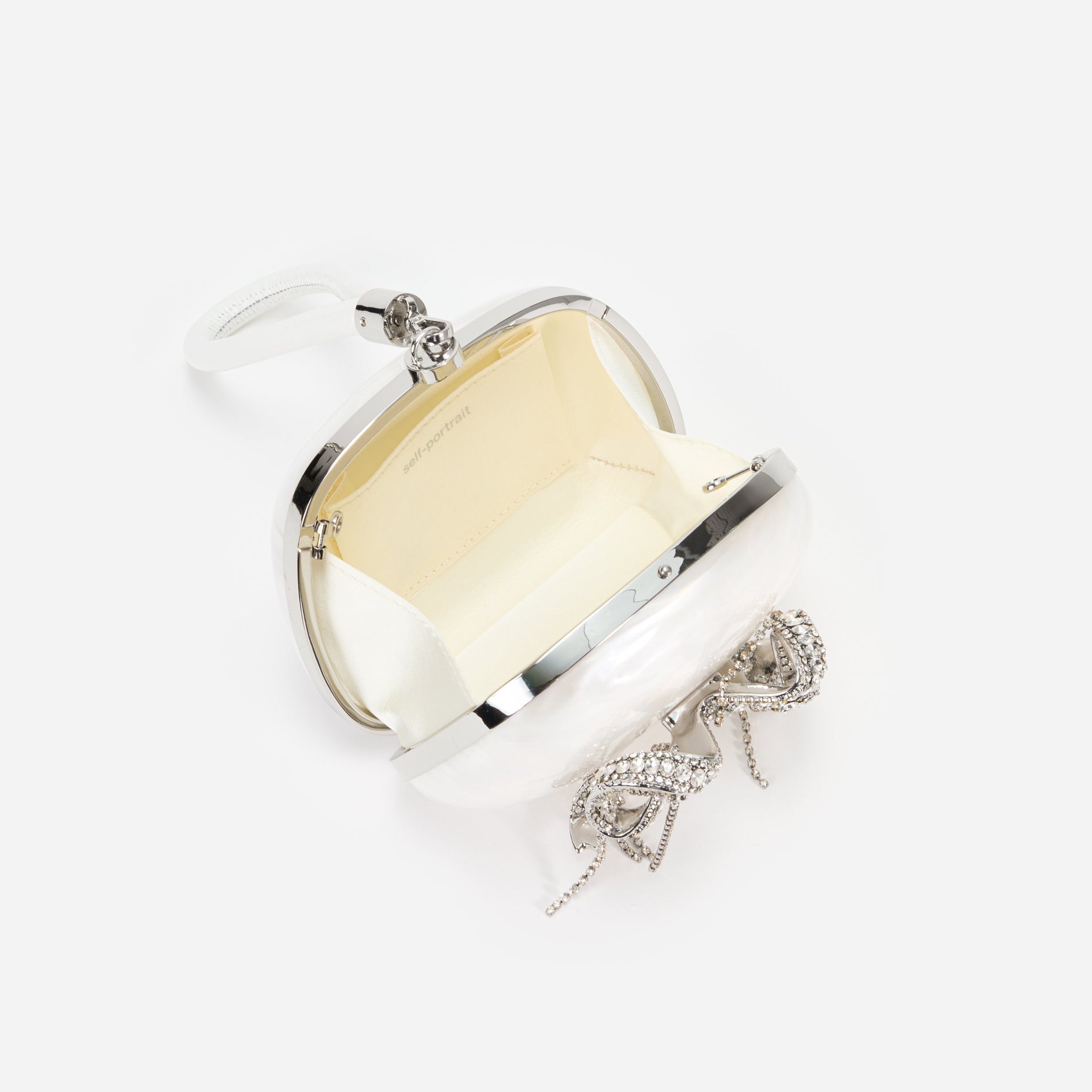 A close up of the fabric for the Pearl Top Handle Clutch Bag