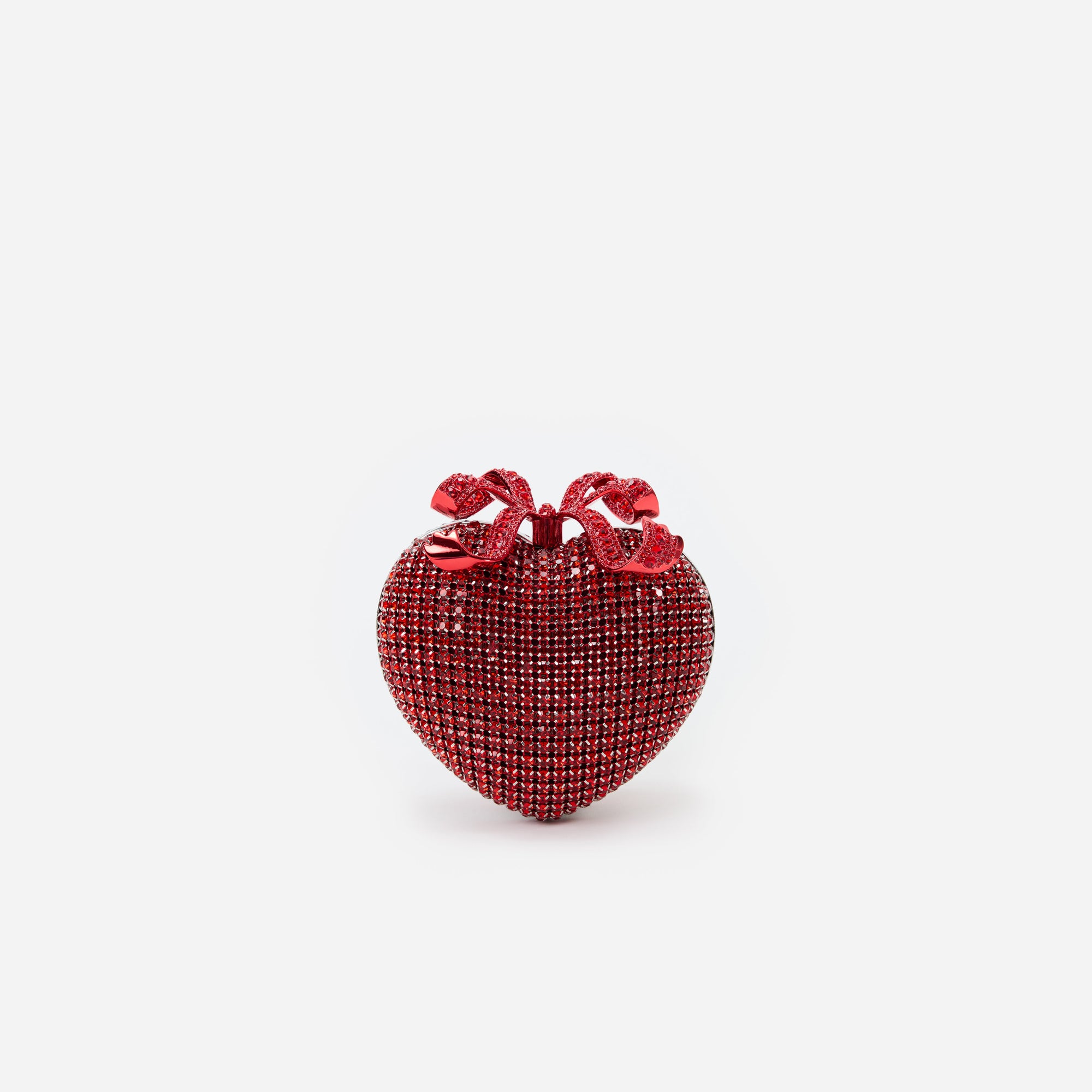 Red heart-shaped ornament with a bow on top, covered in small, sparkling red rhinestones