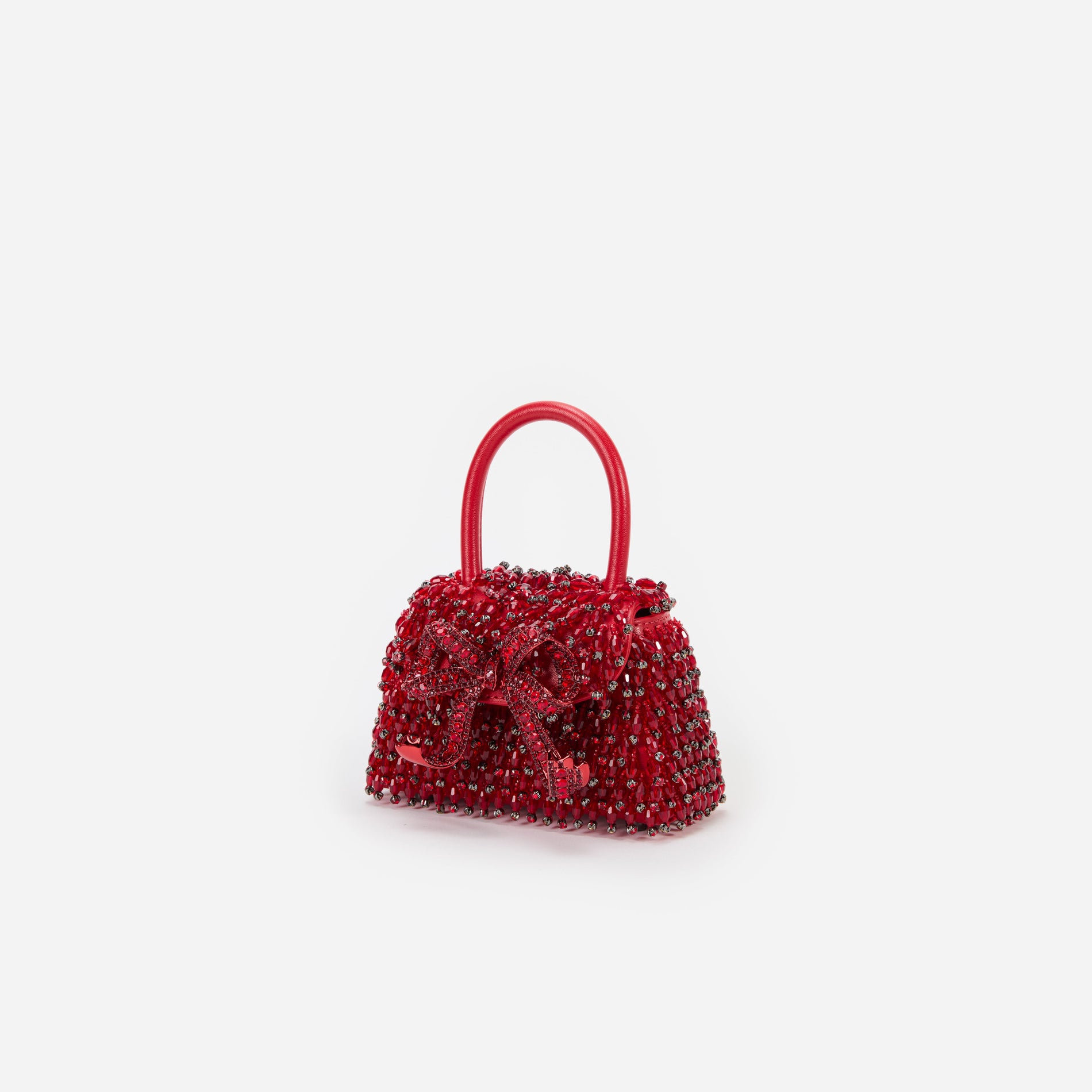 Side view of a woman wearing the Red Embellished Micro Bow Bag
