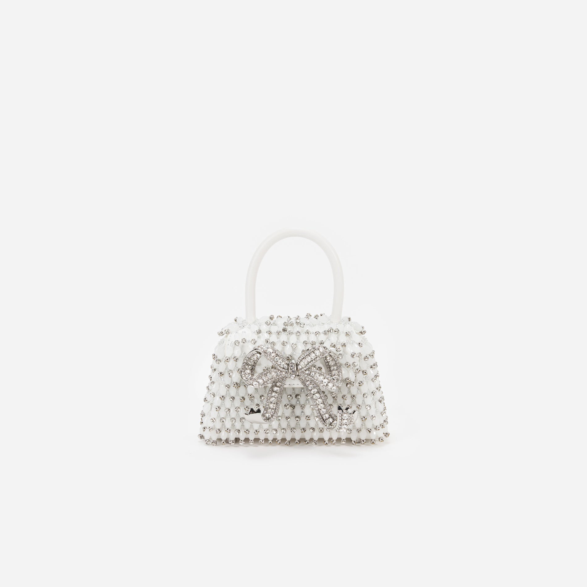 Front view of a woman wearing the White Embellished Micro Bow Bag