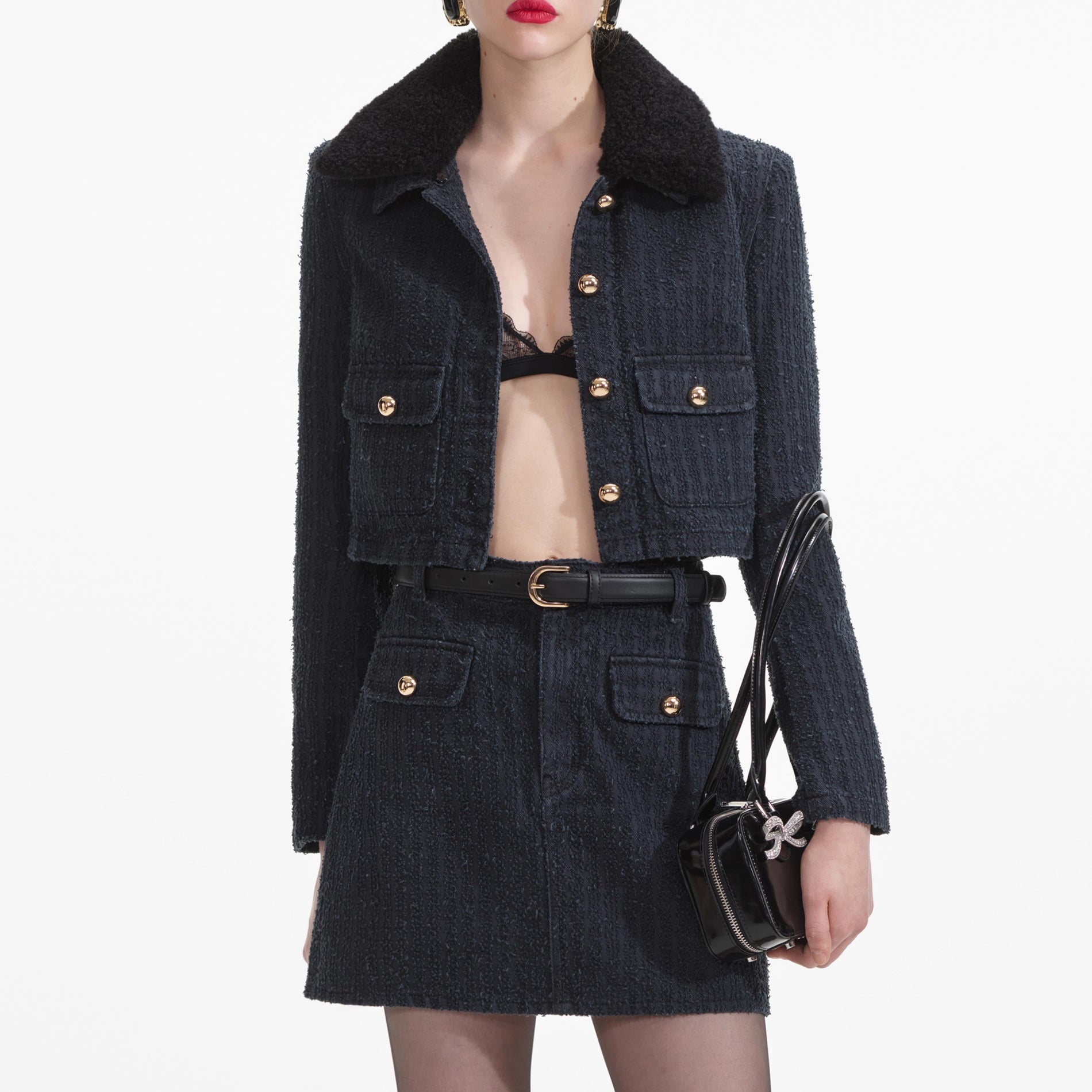 A close up of the fabric for the Grey Textured Denim Mini Skirt