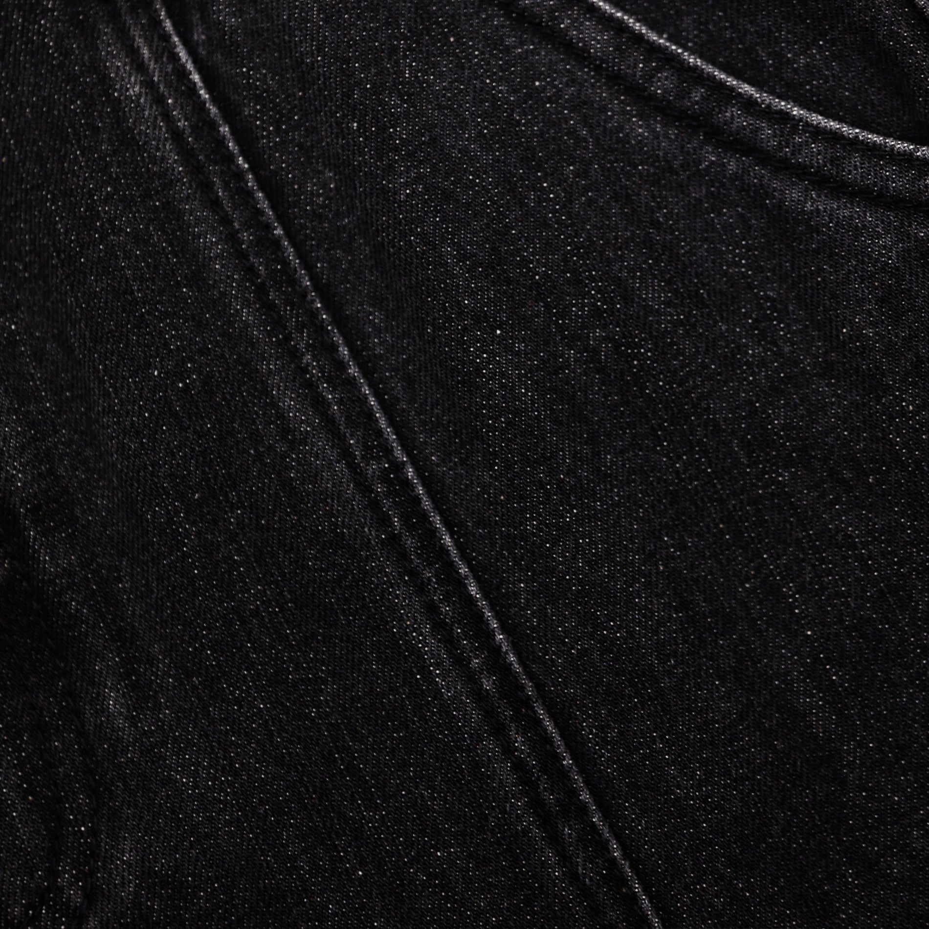 A close up of the fabric for the Black Flared Denim Midi Skirt