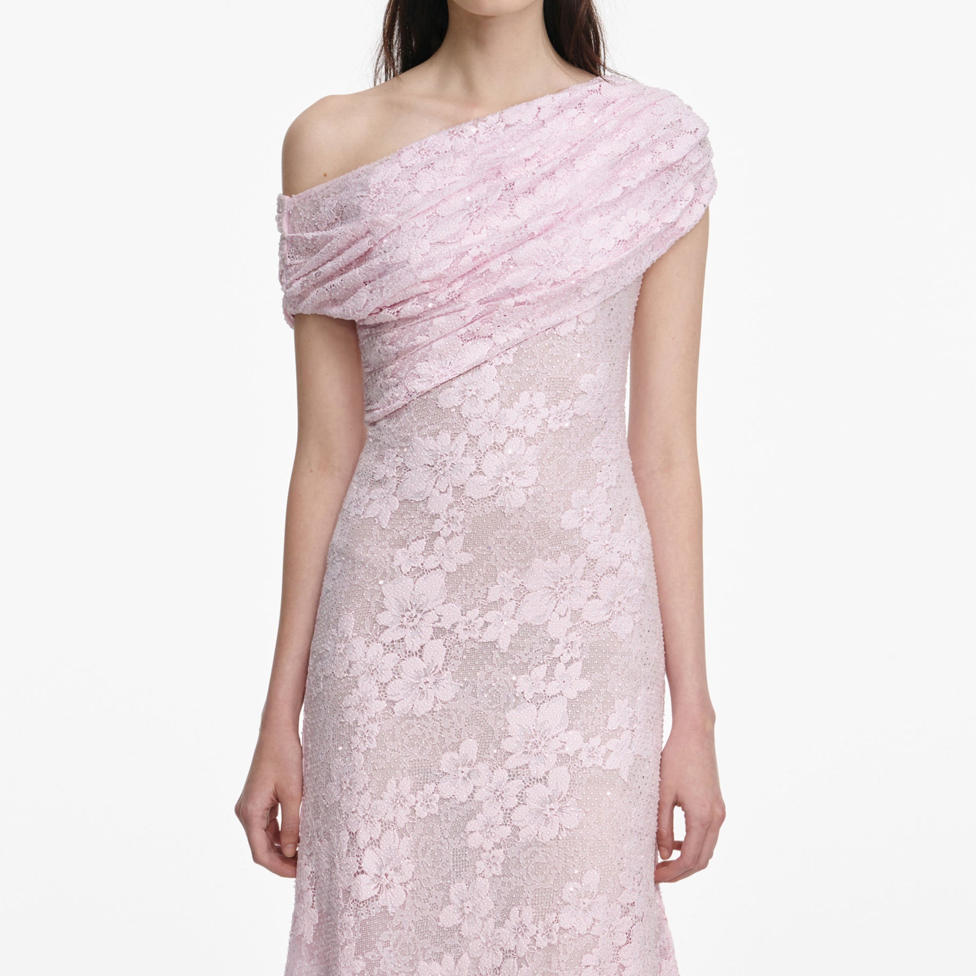 A close up of a woman wearing the Pink Rhinestone Lace Midi Dress