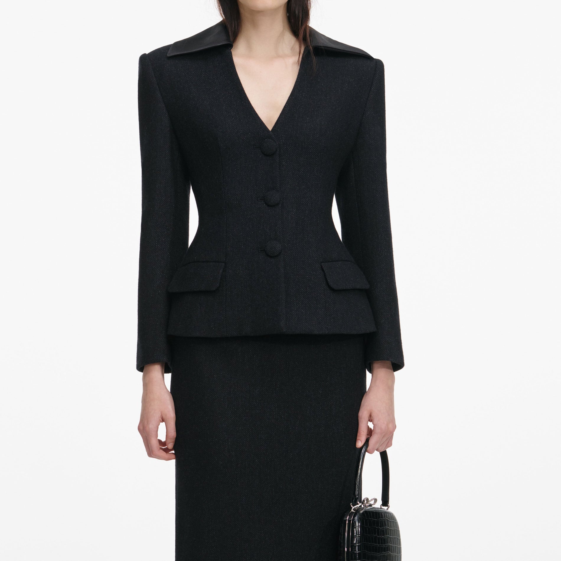 A close up of a woman wearing the Black Blazer Tailored Midi Dress