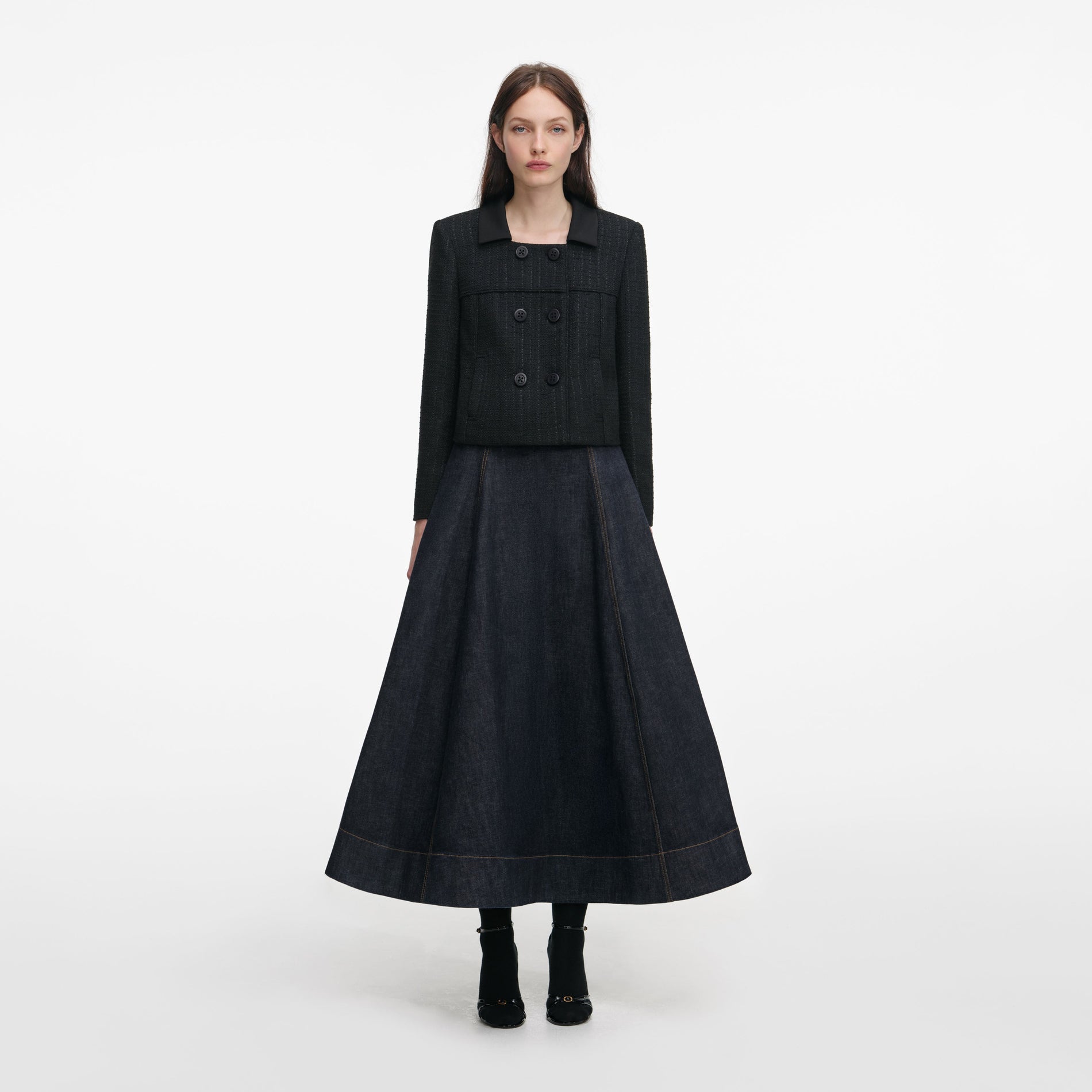 Front view of a woman wearing the Black Boucle Cropped Jacket