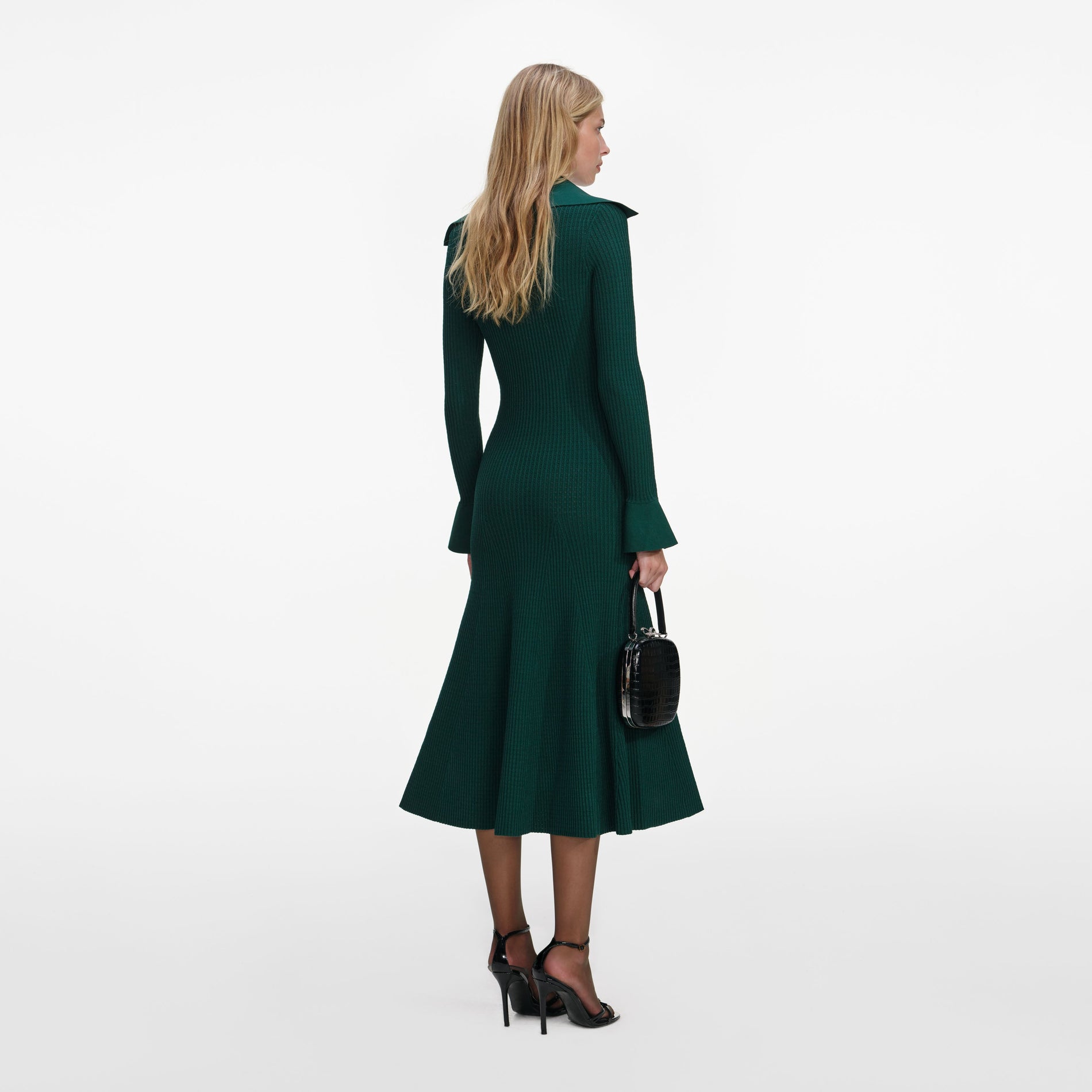 Back view of a woman wearing the Green Keyhole Knit Midi Dress