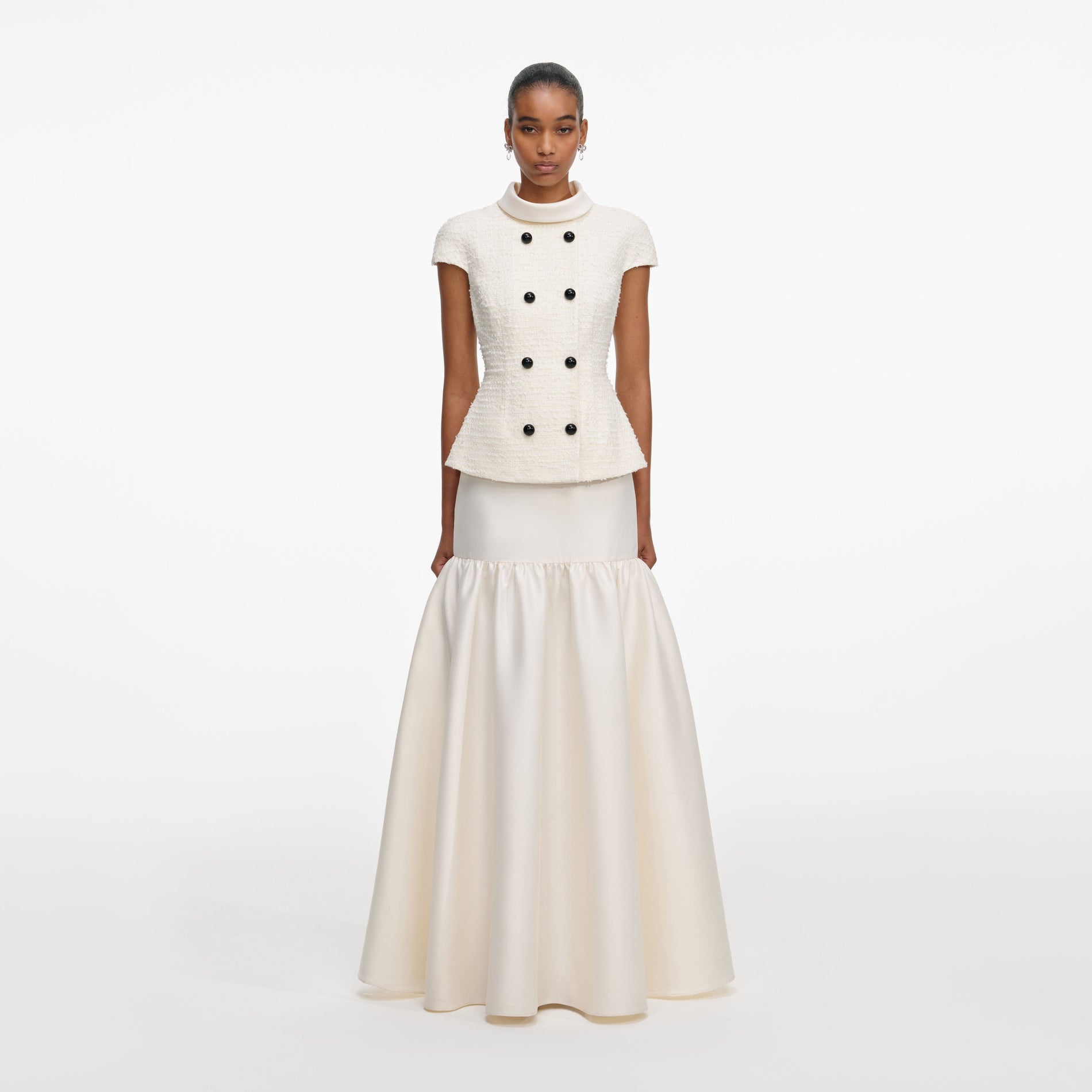 Front view of a woman wearing the Cream Boucle Taffeta Maxi Dress