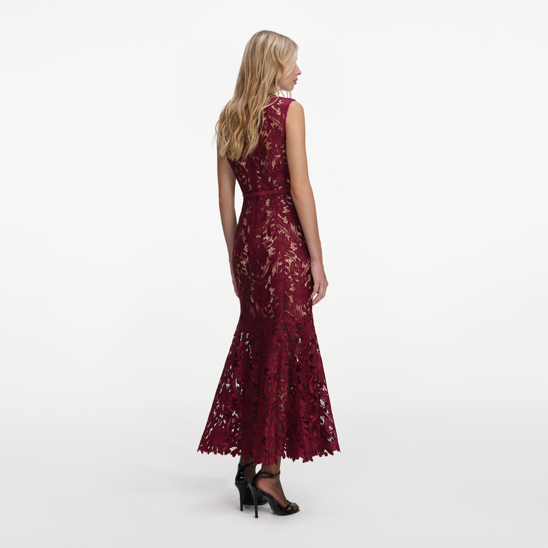 Back view of a woman wearing the Burgundy Guipure Lace Midi Dress