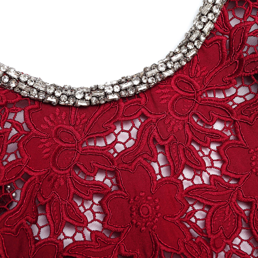 A close up of the fabric for the Burgundy Lace Crystal Top