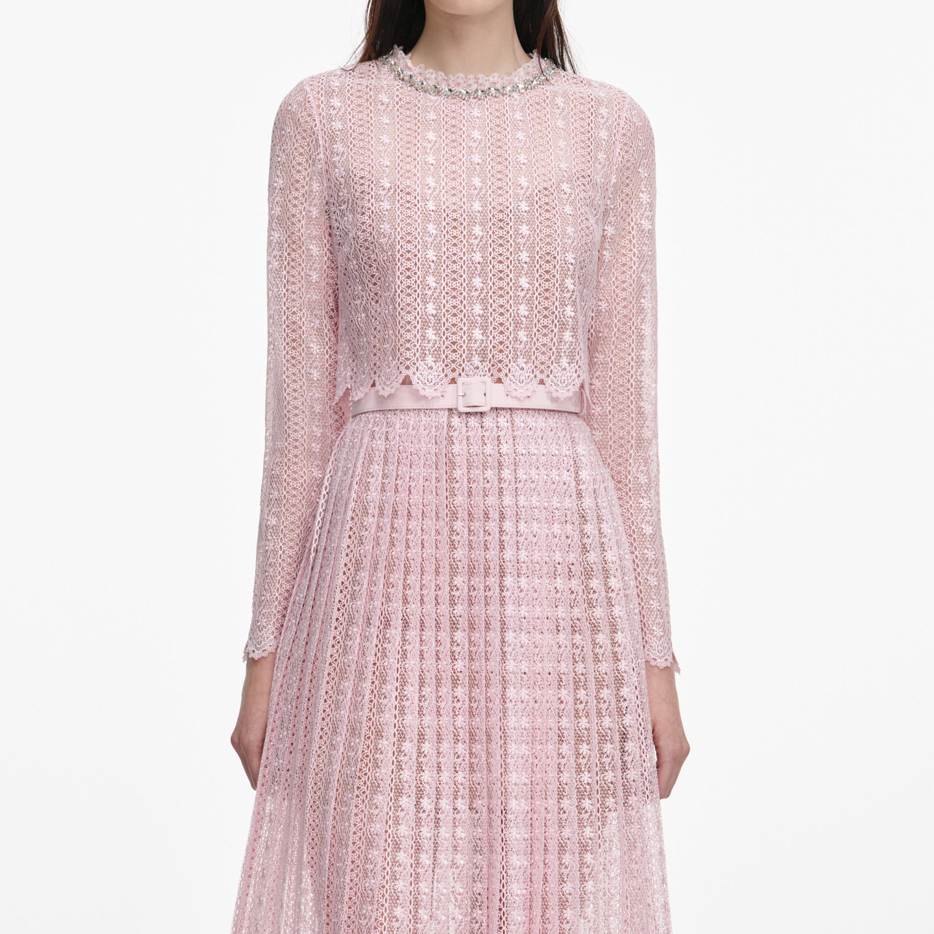 A close up of a woman wearing the Pink Organza Lace Midi Dress
