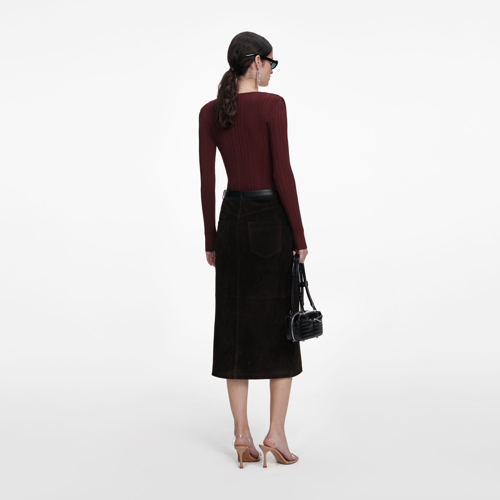 Back view of a woman wearing the Brown Contrast Lace Knit Top