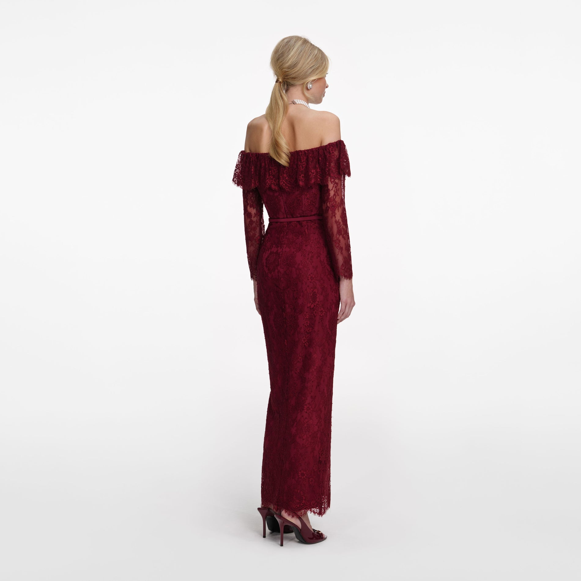 Back view of a woman wearing the Burgundy Off Shoulder Gathered Lace Maxi Dress