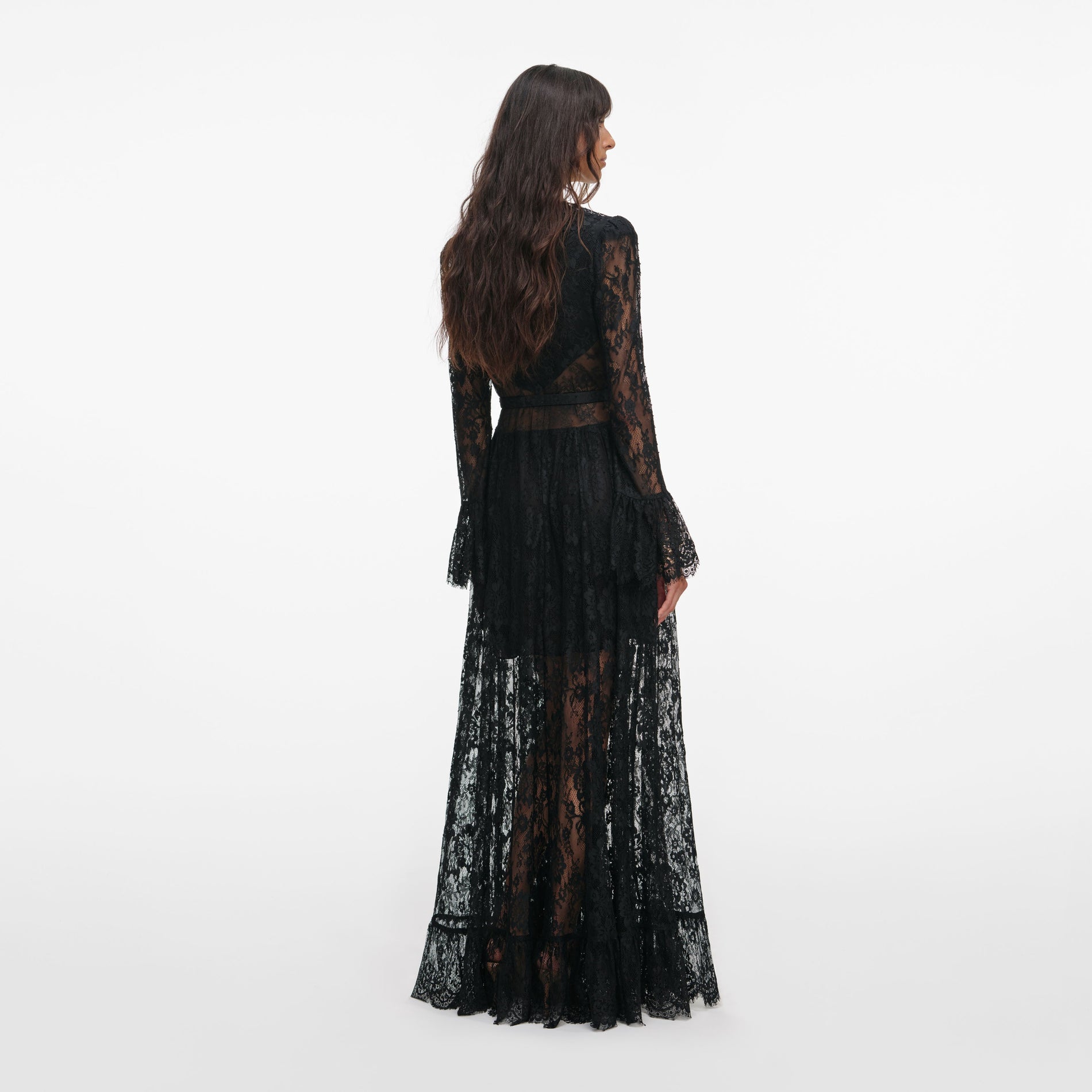 Back view of a woman wearing the Black Lace Ruffle Maxi Dress