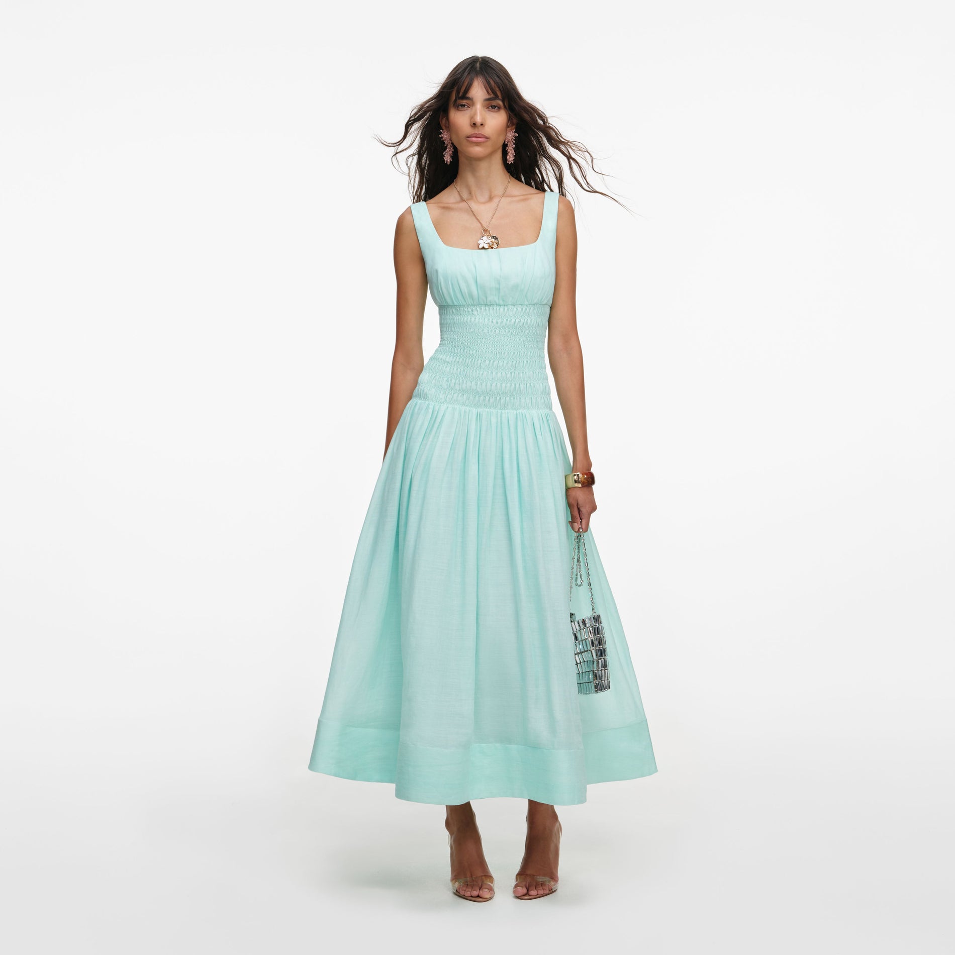 Front view of a woman wearing the Mint Ramie Midi Dress