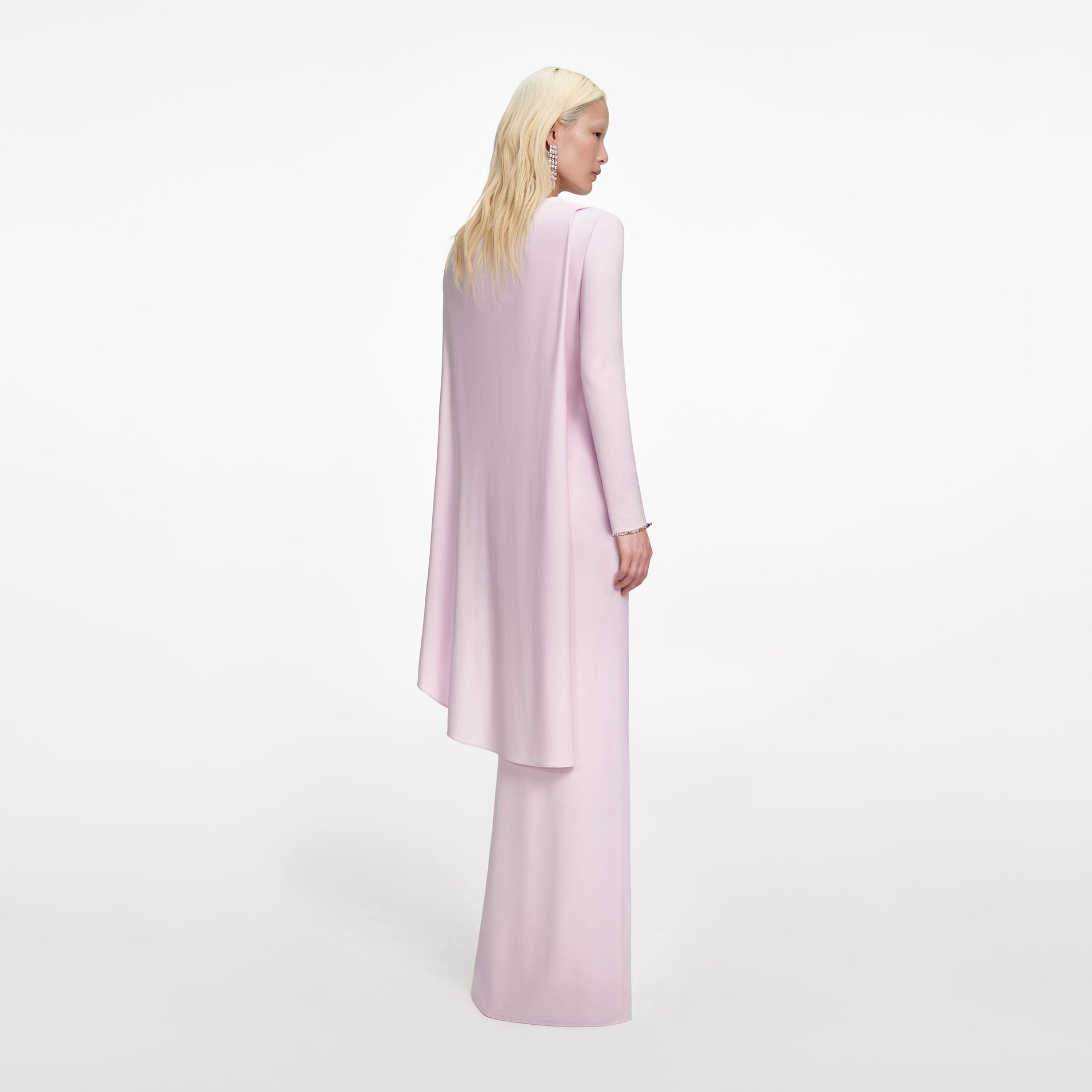 Back view of a woman wearing the Pink Jersey Drape Maxi Dress