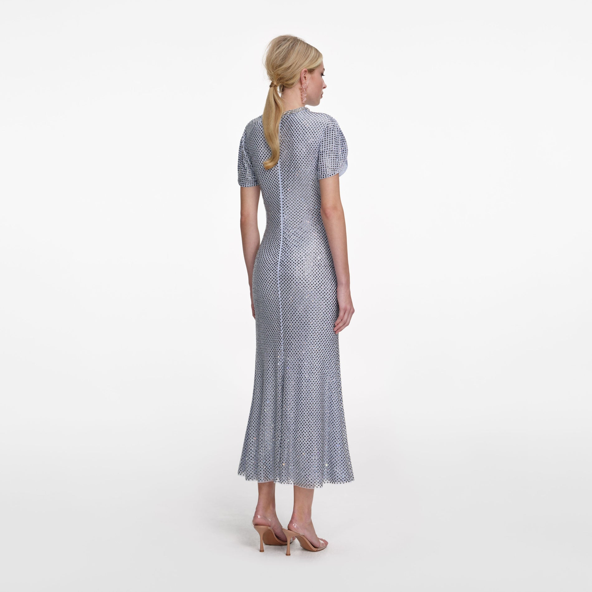 Back view of a woman wearing the Blue Rhinestone Mesh Midi Dress