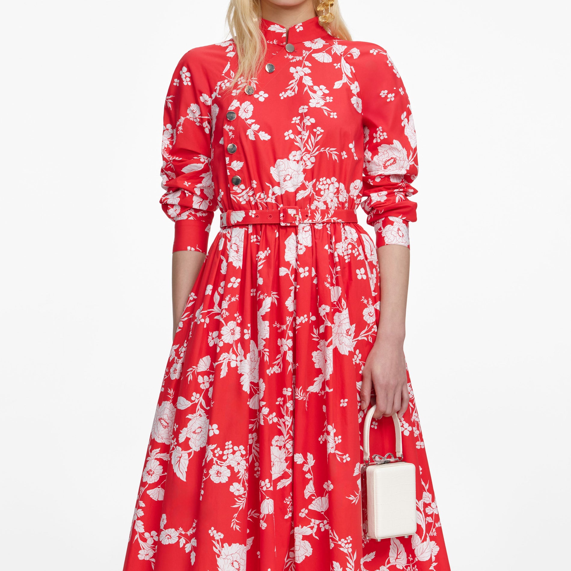 A close up of a woman wearing the Red Floral Cotton Midi Dress