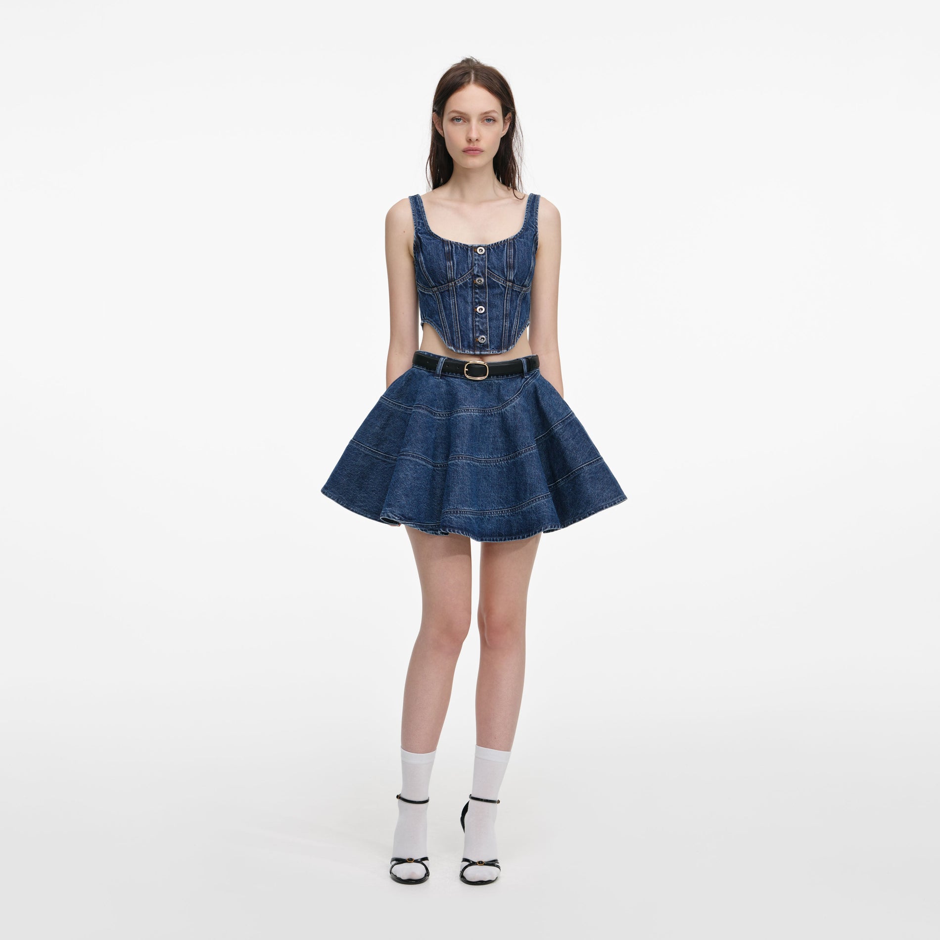 Front view of a woman wearing the Denim Corset Top