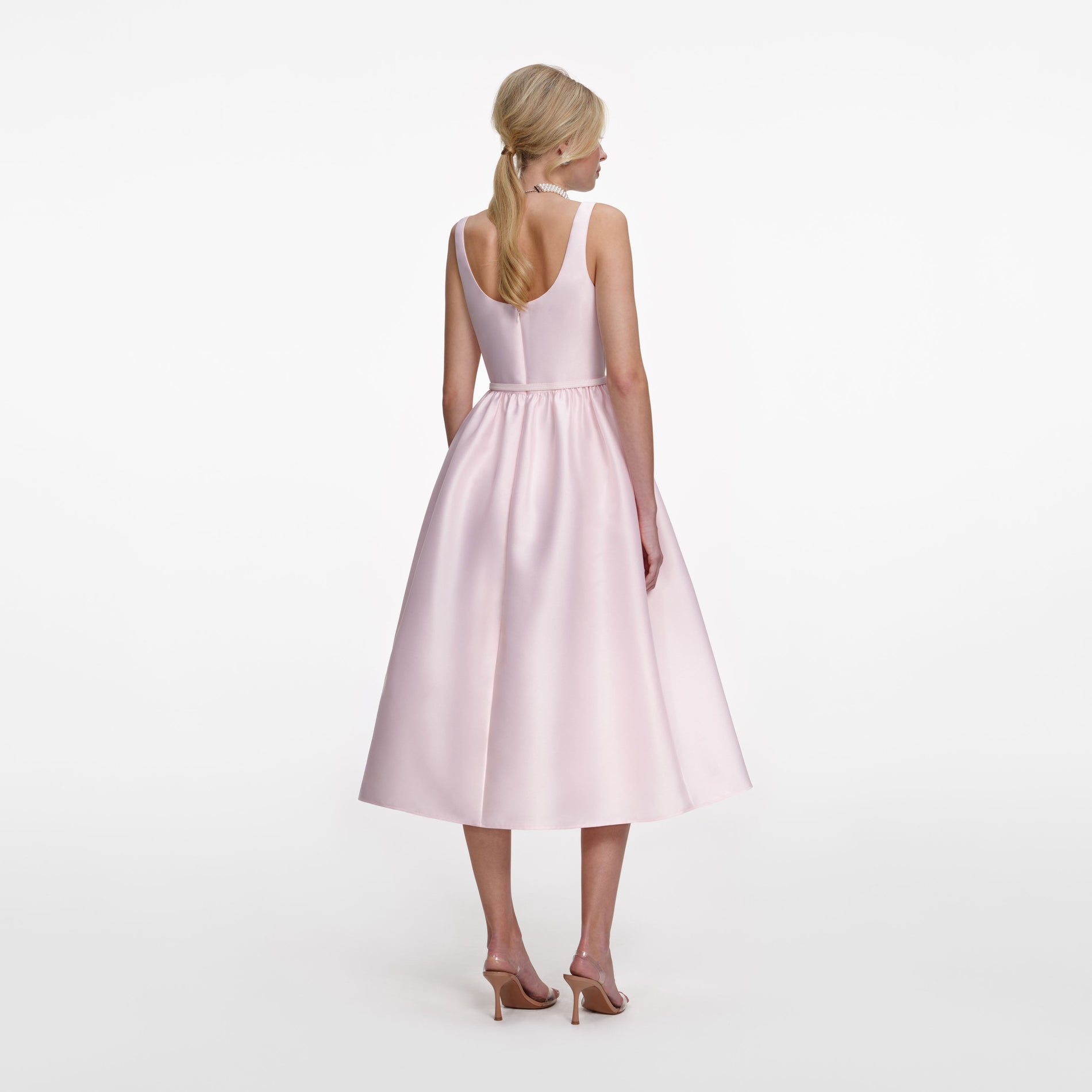 Back view of a woman wearing the Pink Taffeta Midi Dress