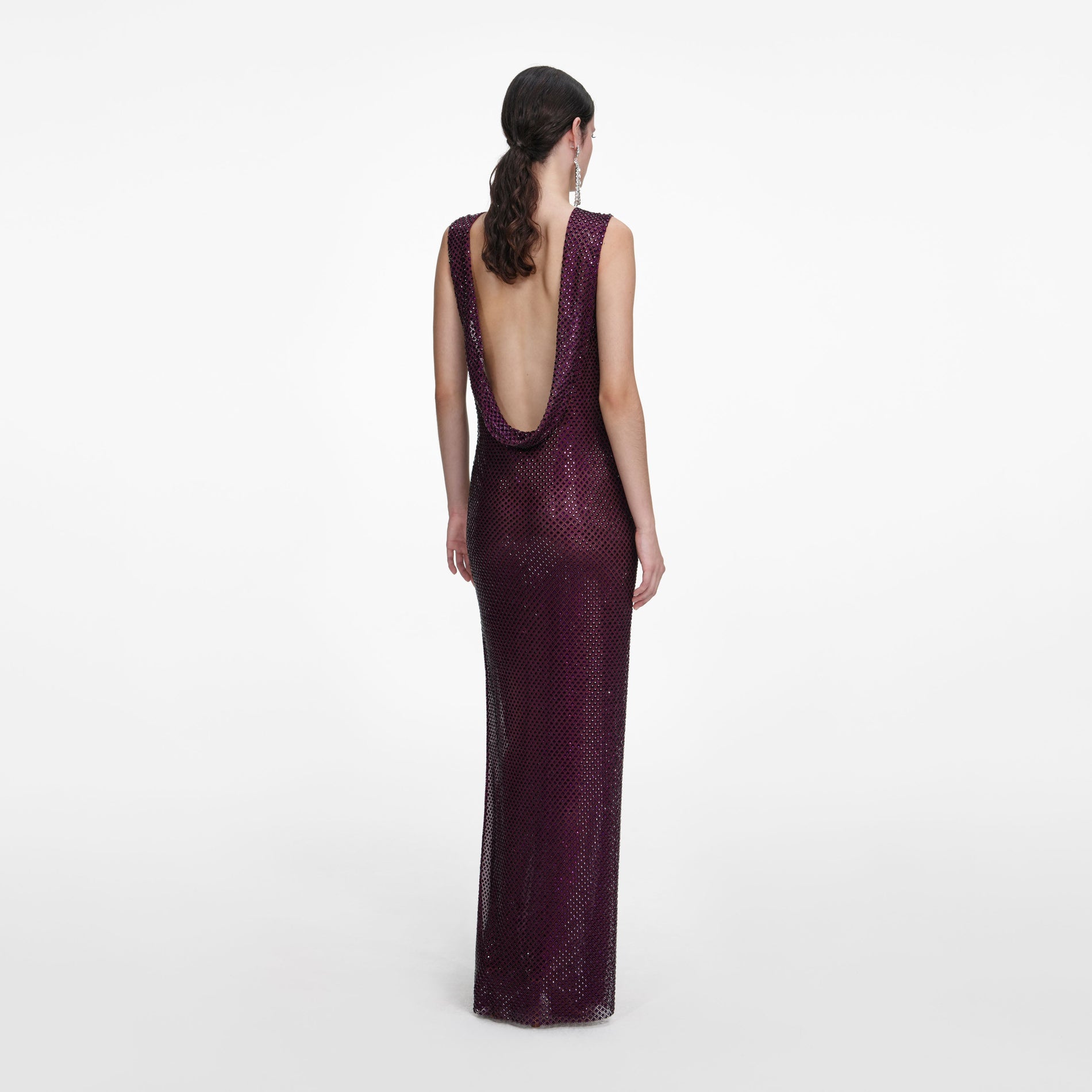 Back view of a woman wearing the Burgundy Rhinestone Drape Maxi Dress