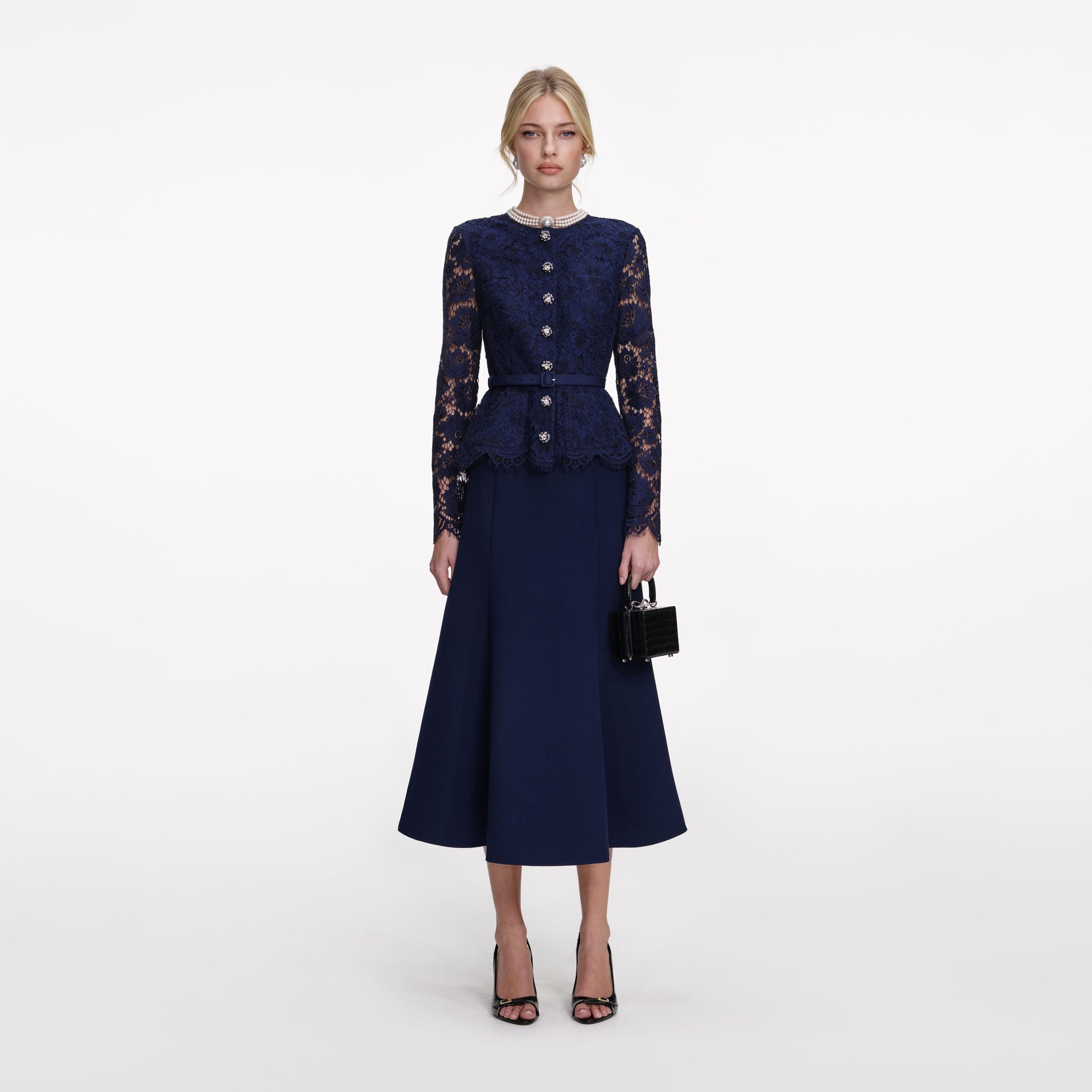 Front view of a woman wearing the Navy Tailored Lace Midi Dress