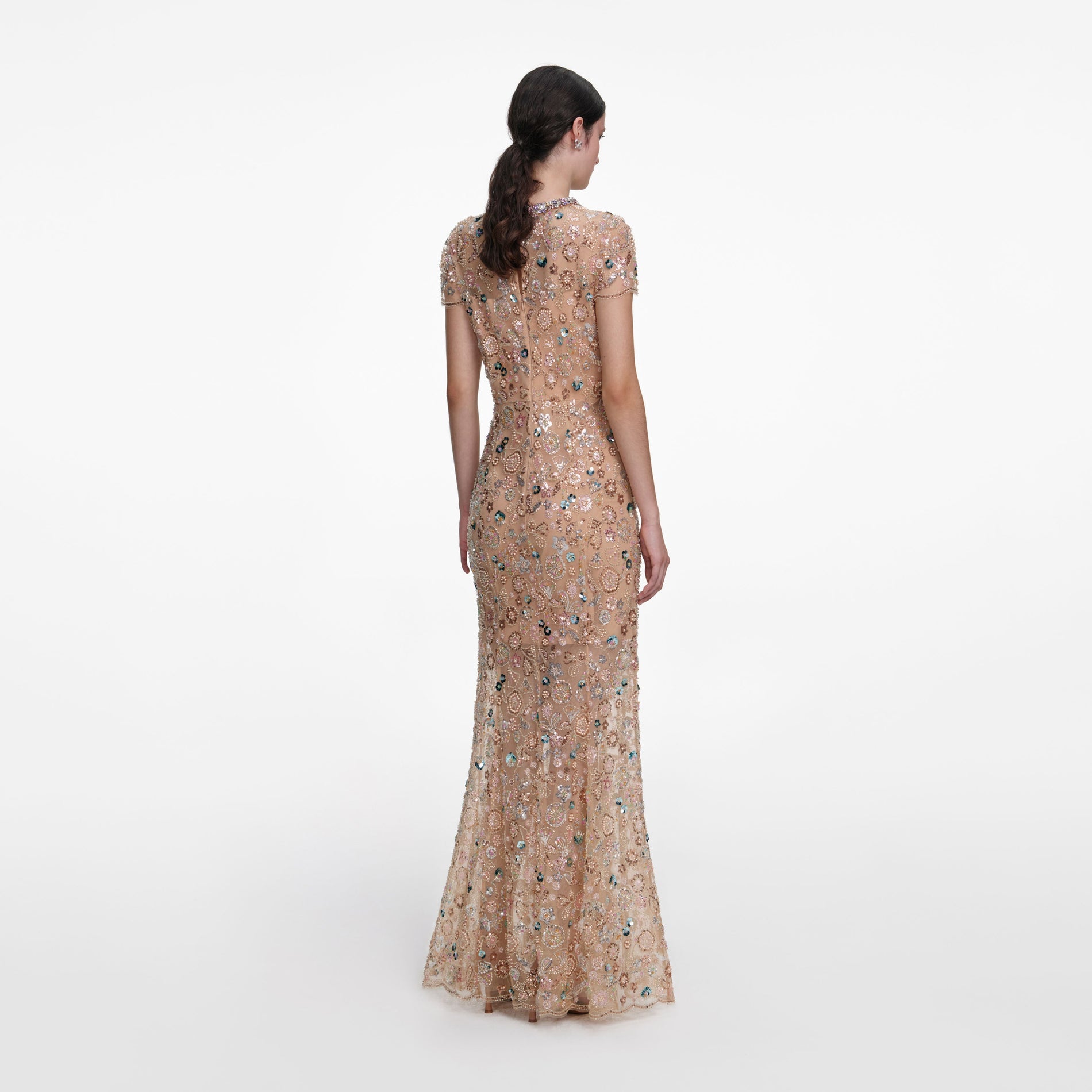 Back view of a woman wearing the Champagne Sequin Embroidered Maxi Dress