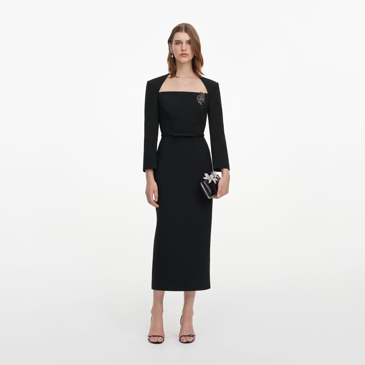 Front view of a woman wearing the Black Tailored Brooch Midi Dress