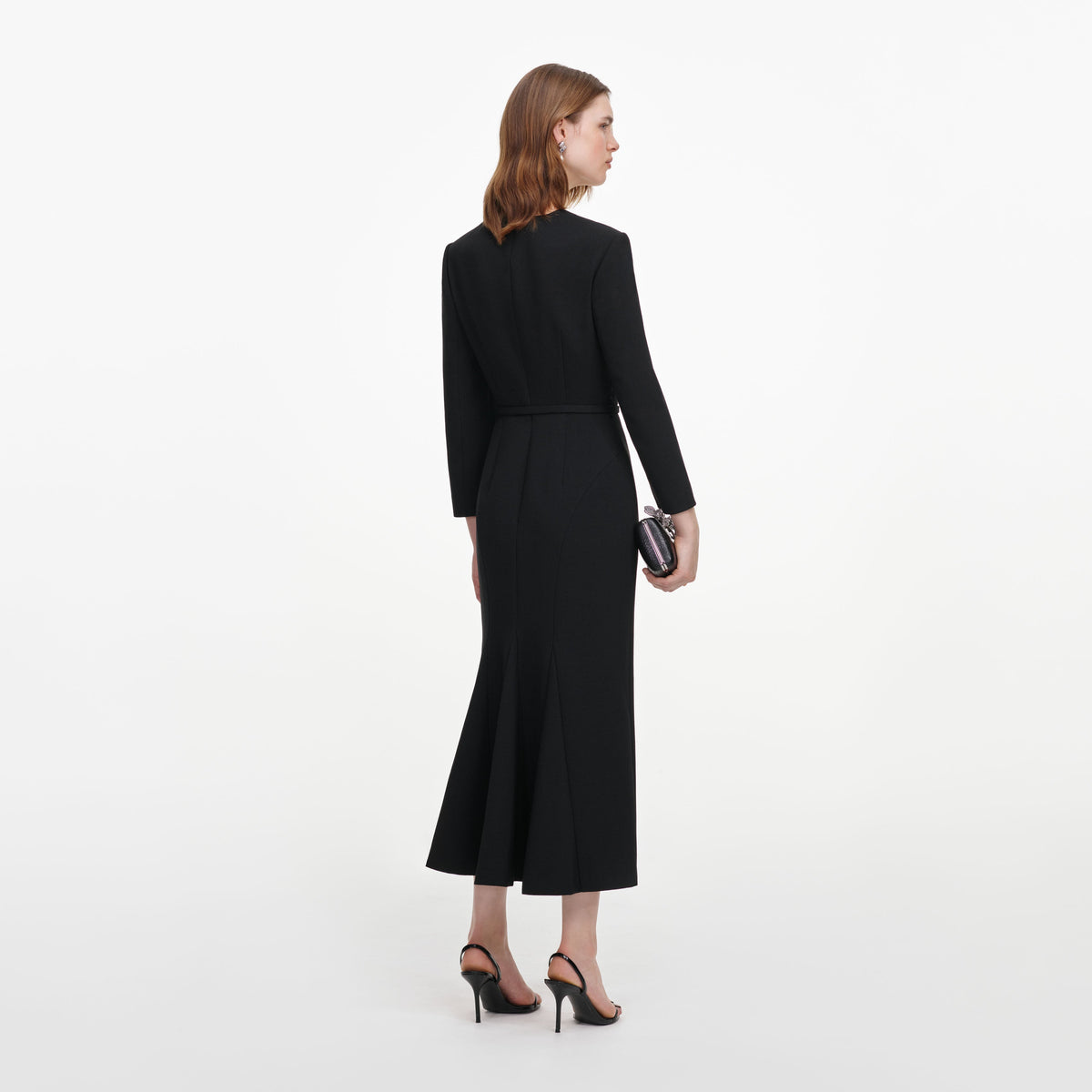 Back view of a woman wearing the Black Tailored Brooch Midi Dress