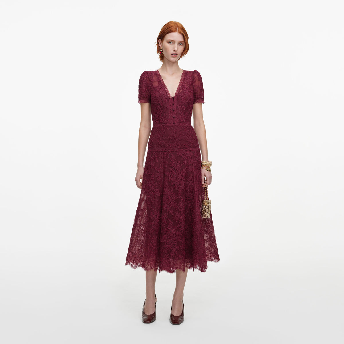 Front view of a woman wearing the Burgundy Lace Midi Dress