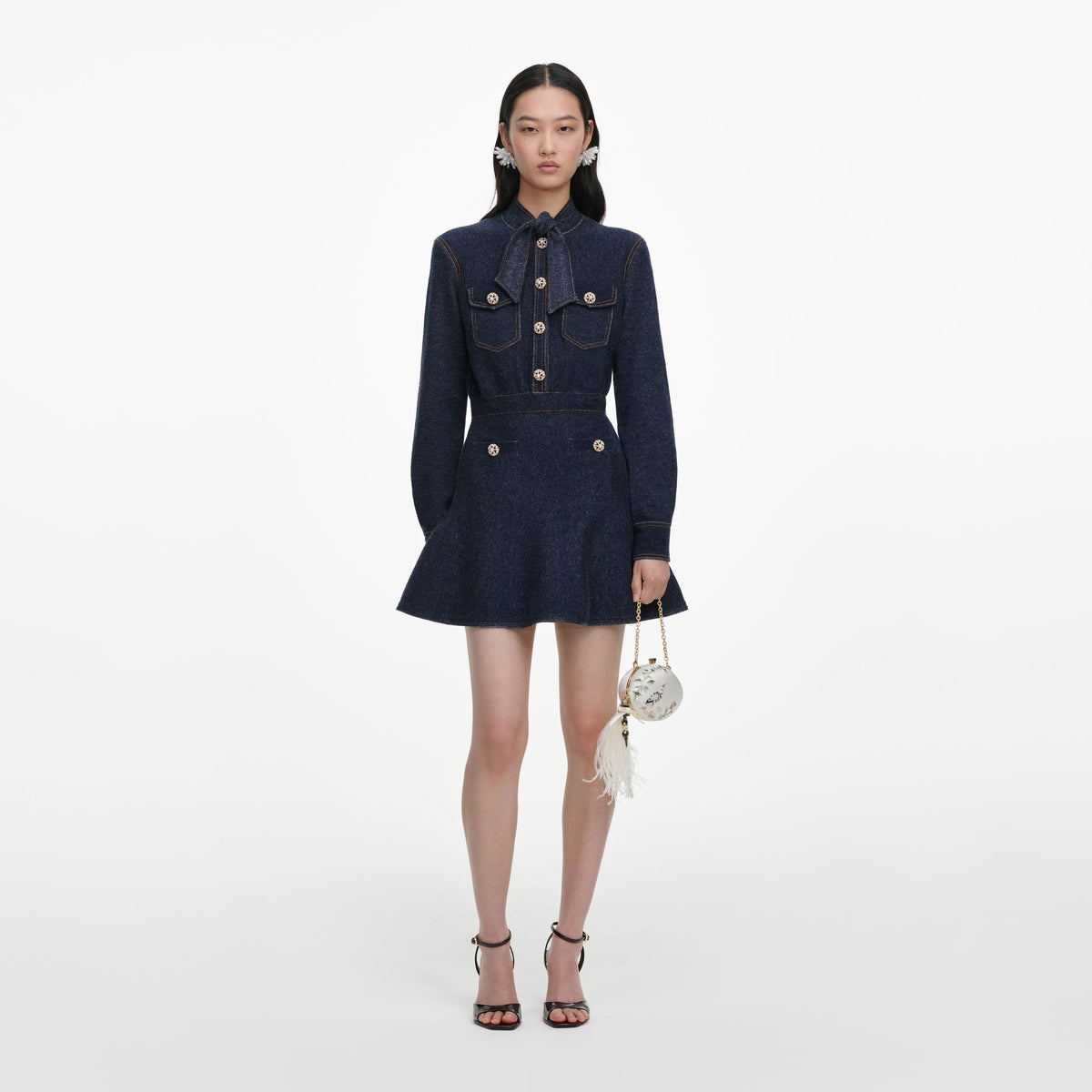 Front view of a woman wearing the Navy Textured Knit Mini Dress